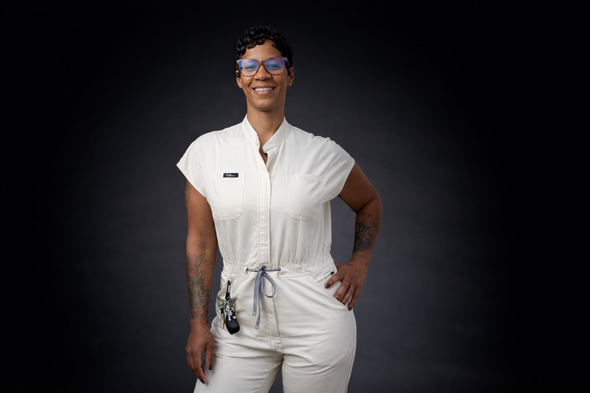 black and brown leather padded tub sofa