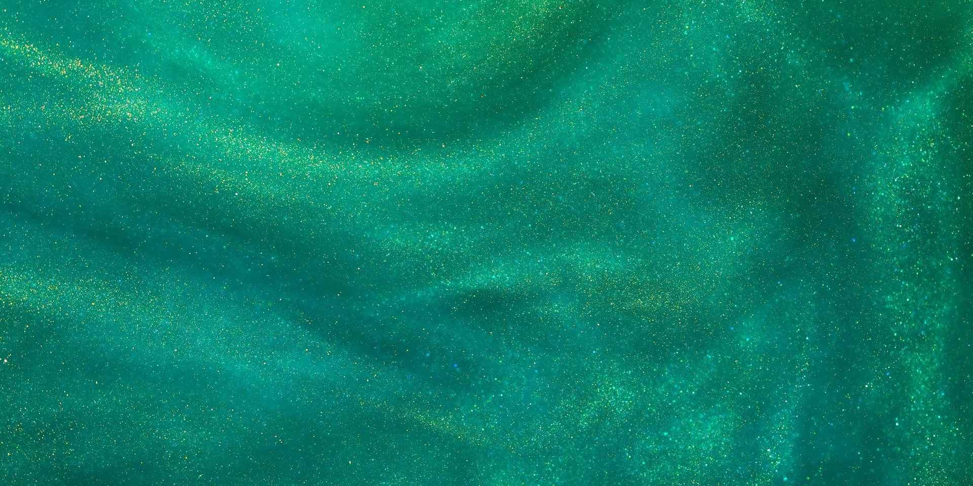 Fond site internet L. Dalion auteure - paillettes dans différents tons de vert - fantasy.