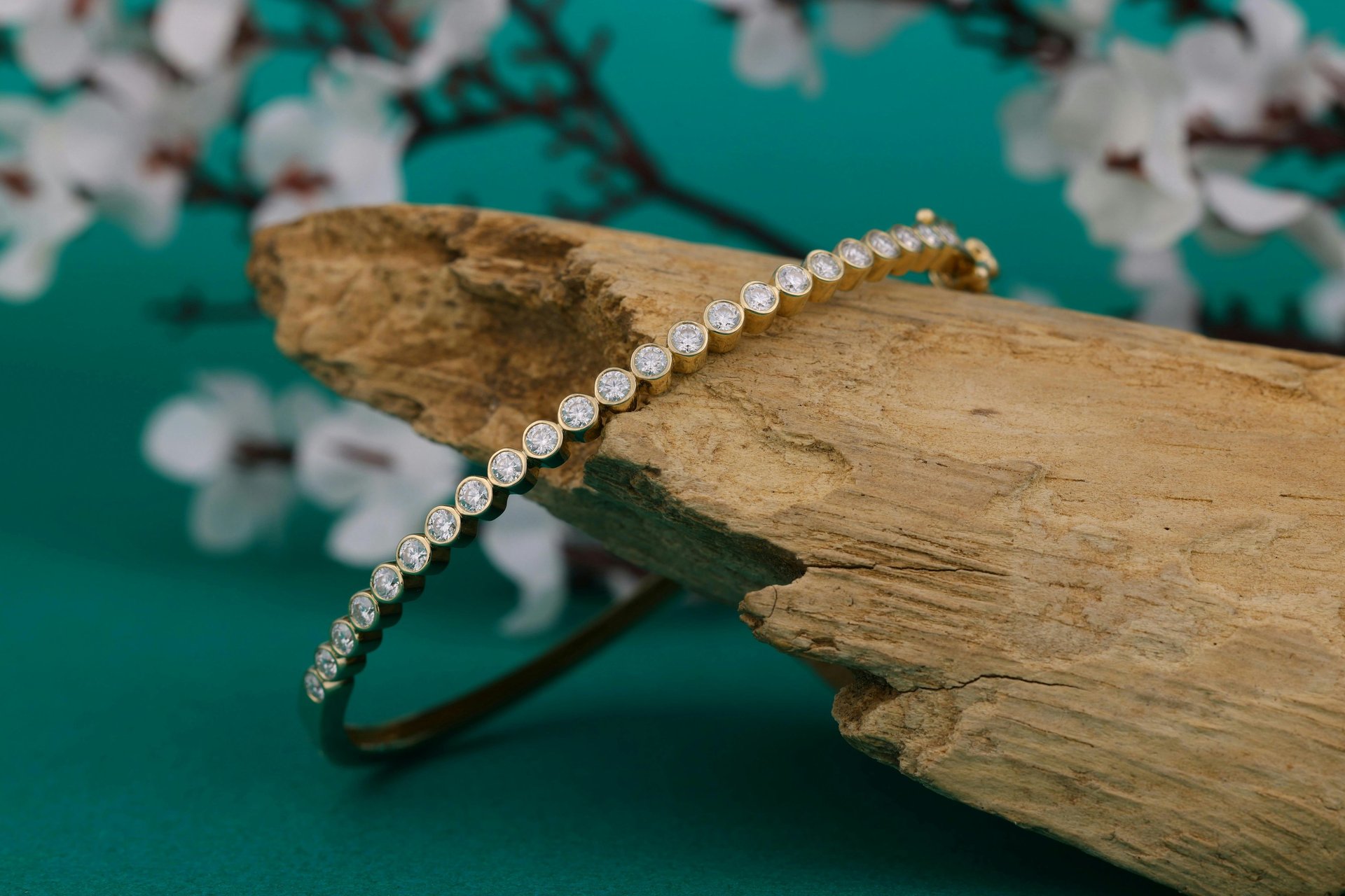 brown wooden house near lake surrounded by green trees during daytime