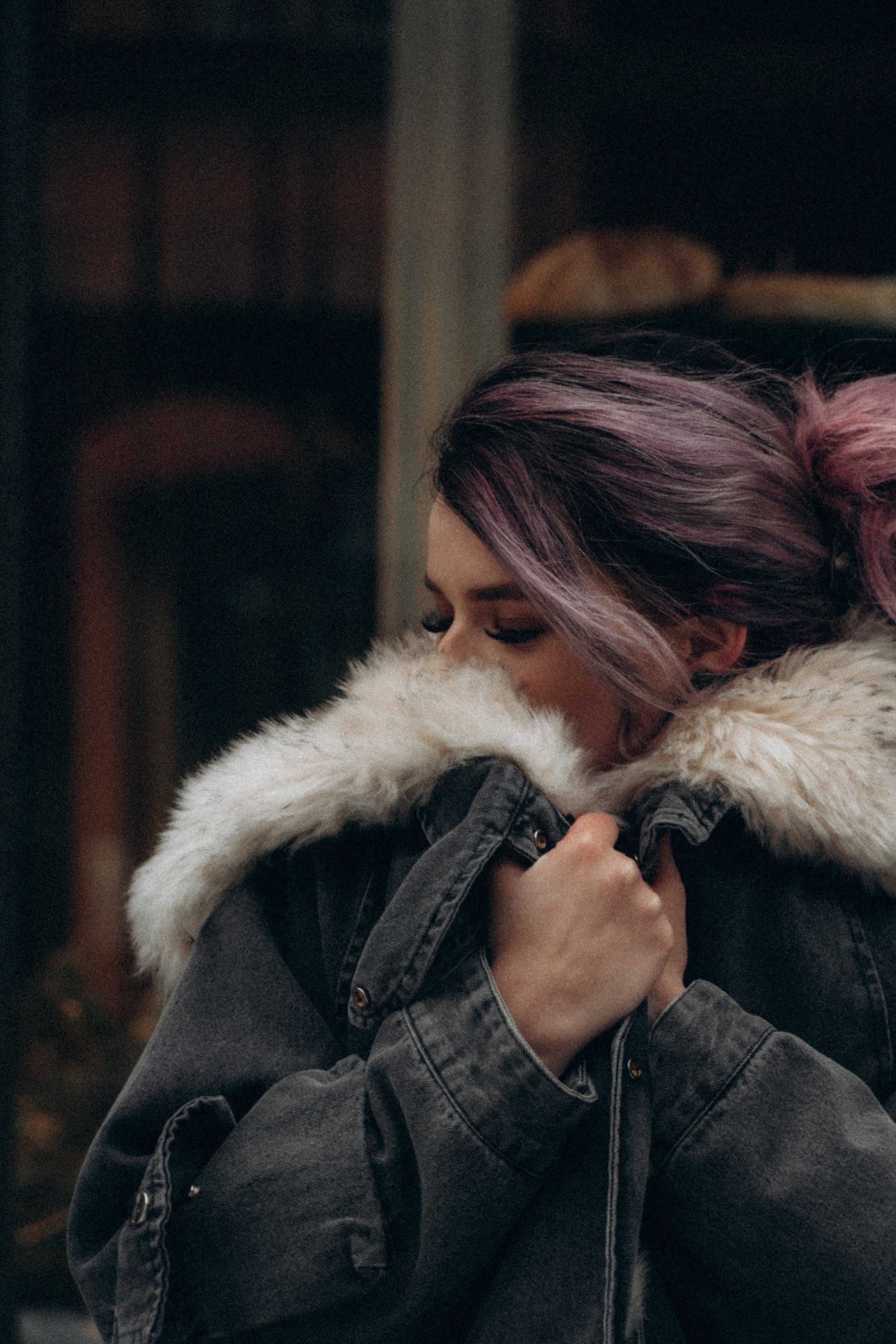 an abstract photo of a curved building with a blue sky in the background