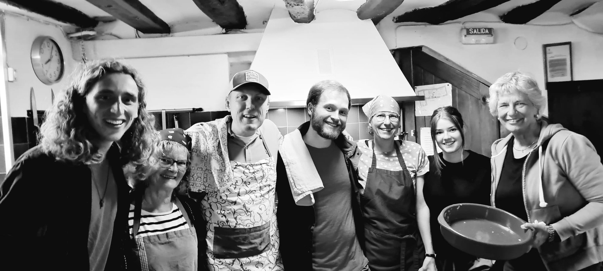 an abstract photo of a curved building with a blue sky in the background