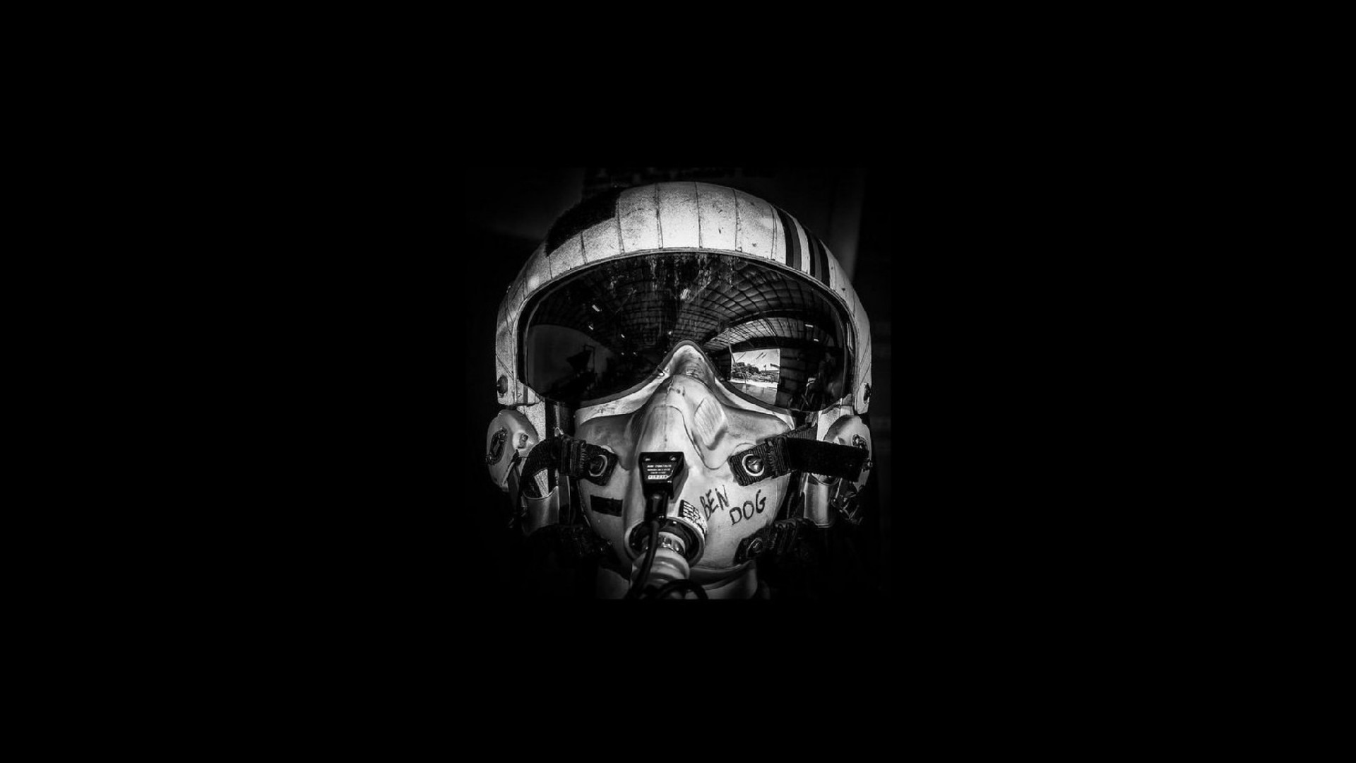 A man wearing a helmet and a gas mask