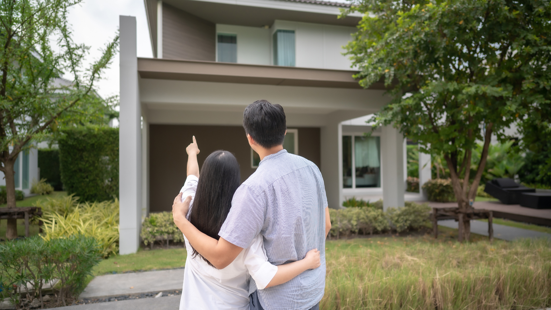 man in blue dress shirt beside man in white dress shirt