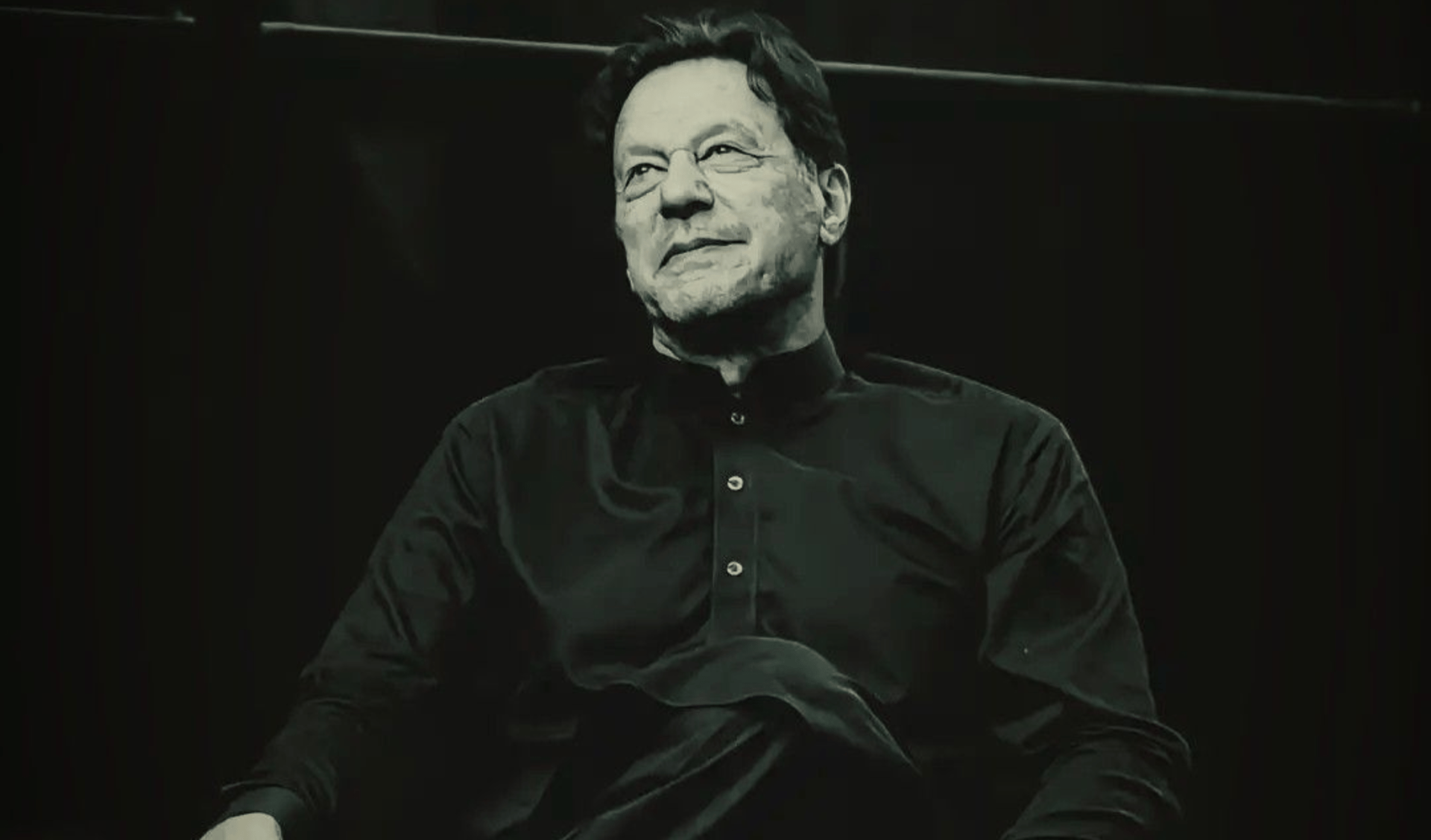 person wearing grey knit sweater