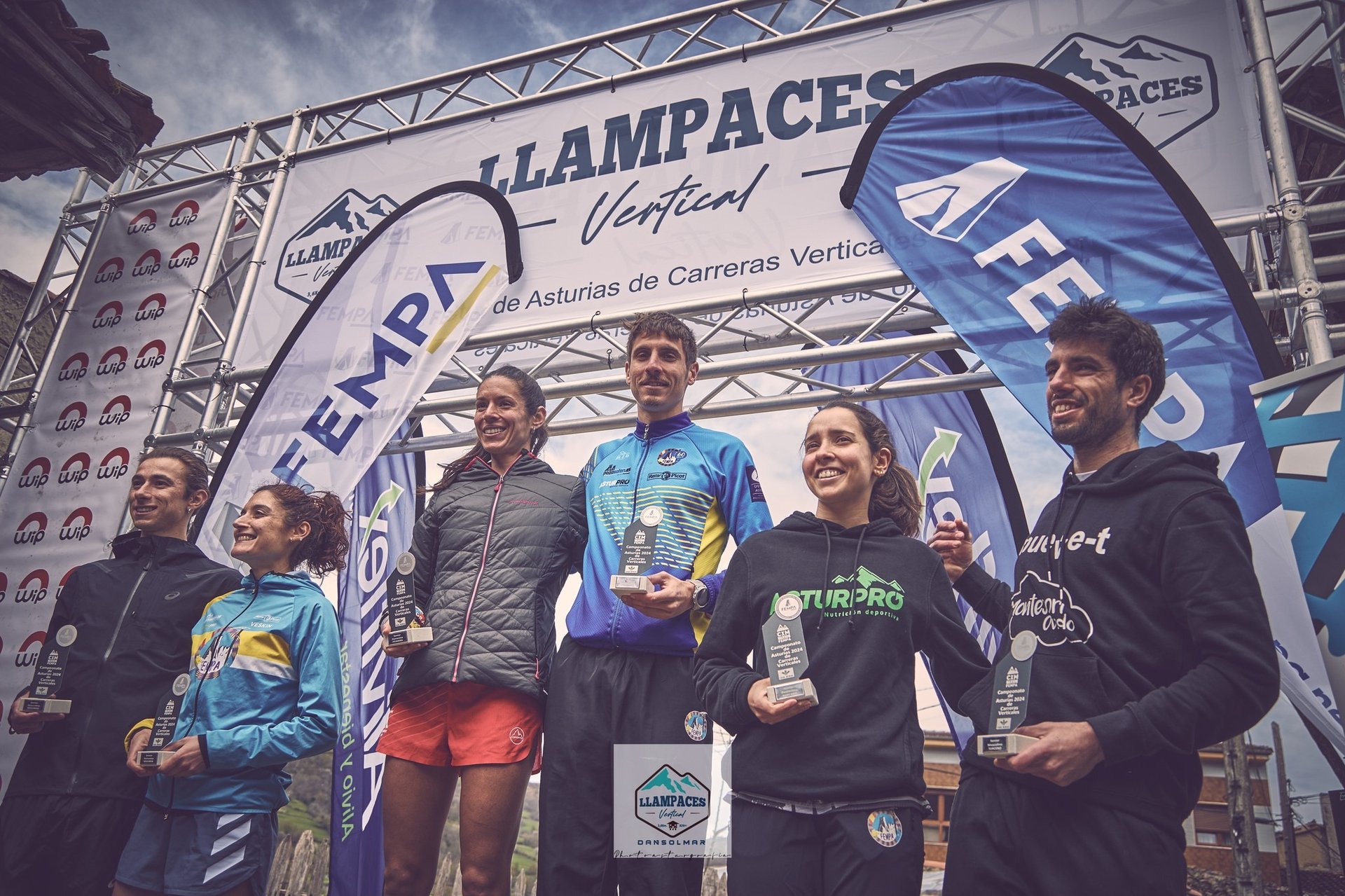 an abstract photo of a curved building with a blue sky in the background