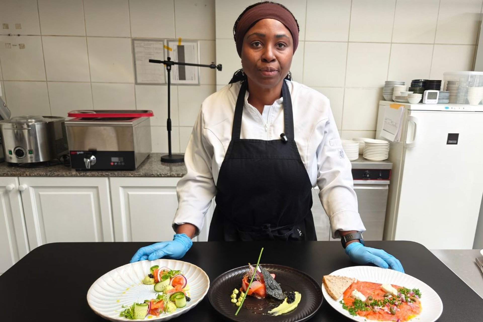 Chef Viviane Williams — fine dining kitchen, calm and professional cooking atmosphere