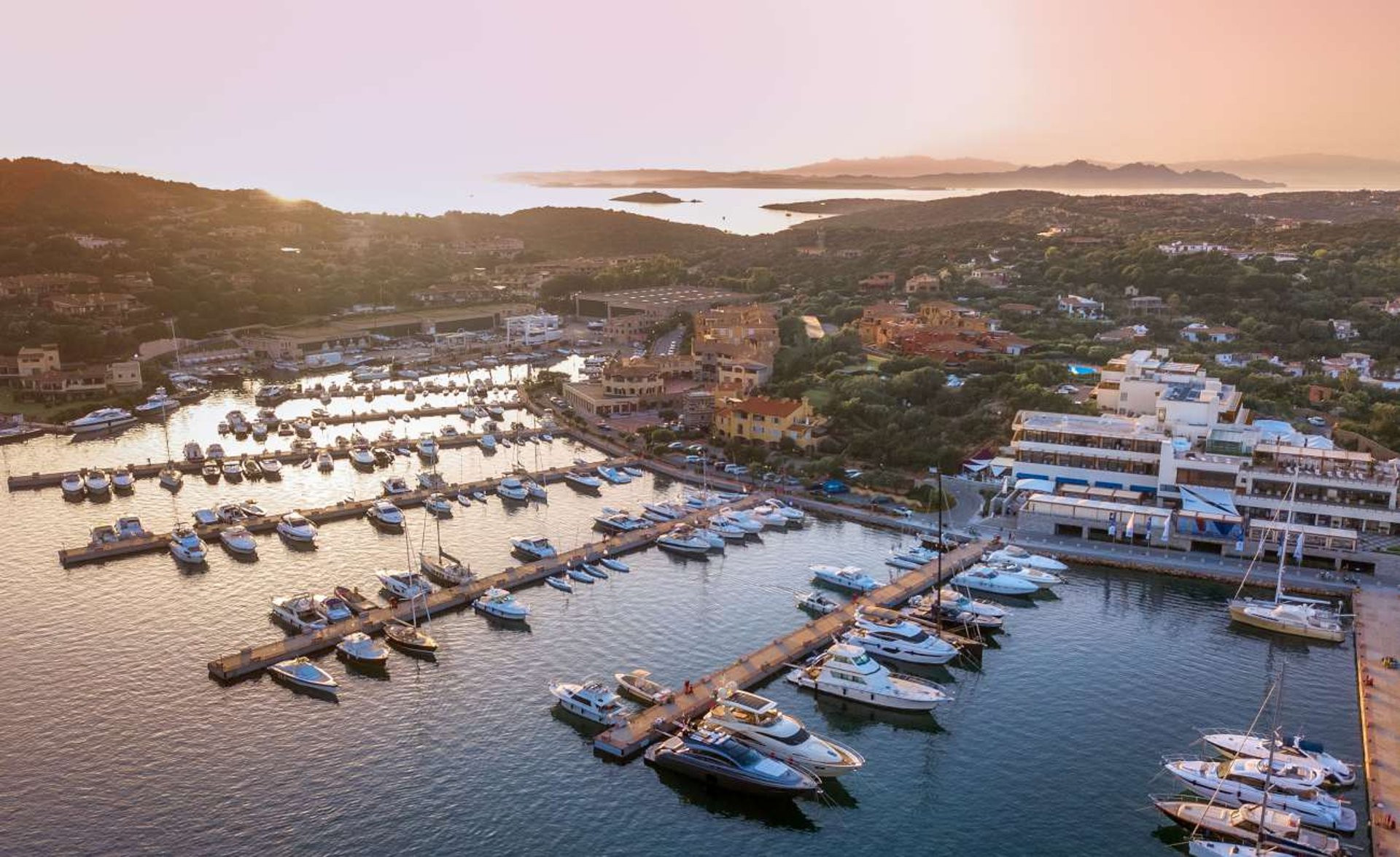 woman wearing yellow long-sleeved dress under white clouds and blue sky during daytime