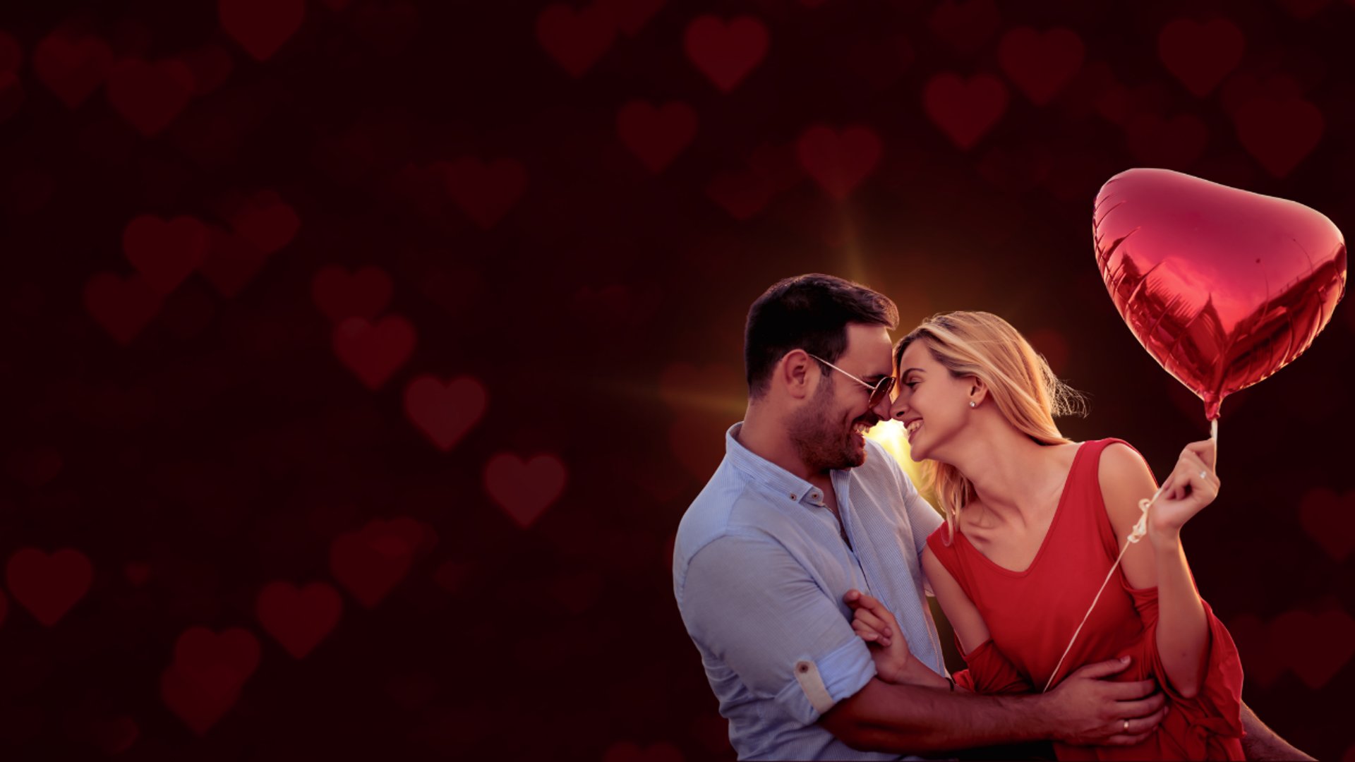a string of red paper hearts on a black background