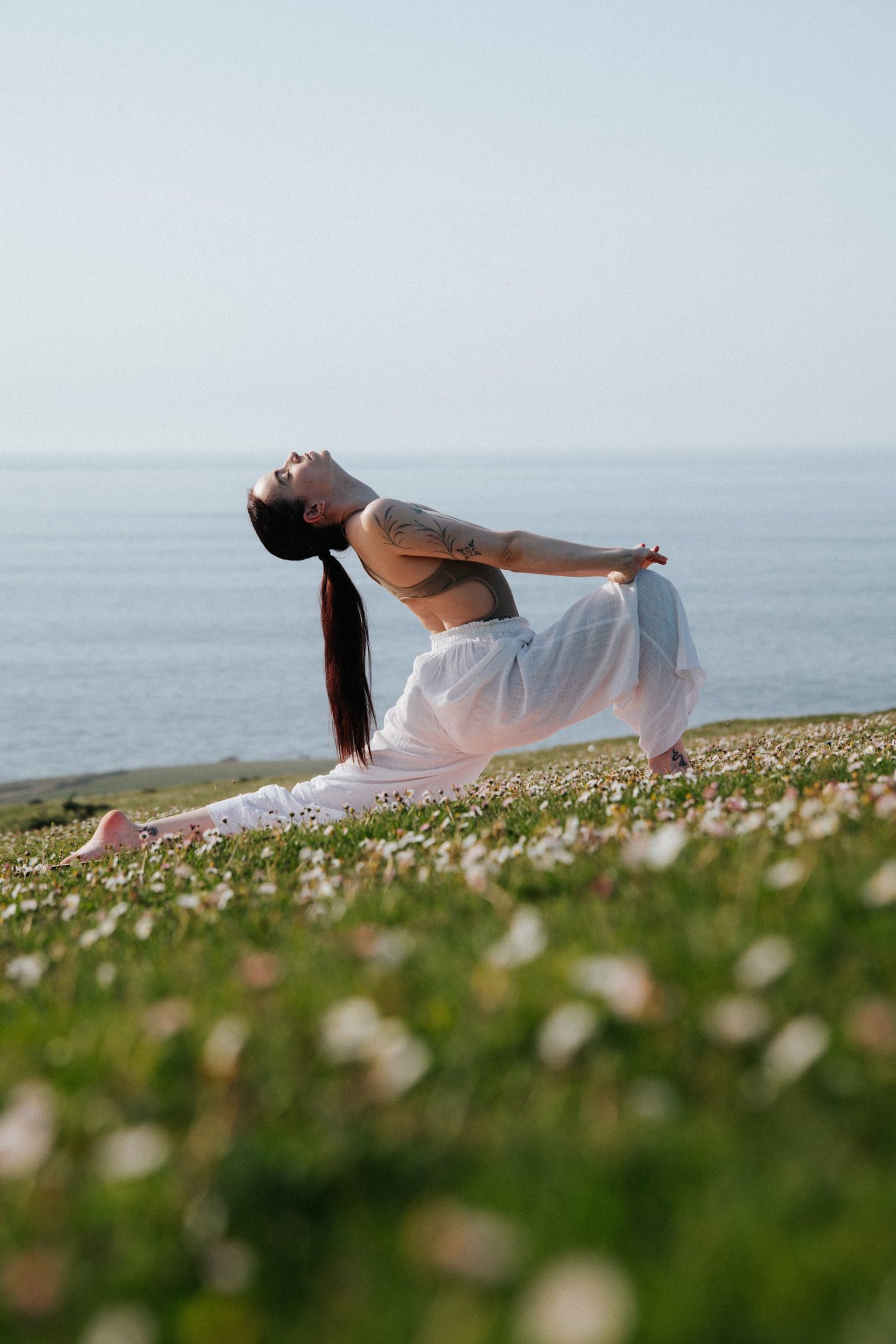 topless woman lying on bed