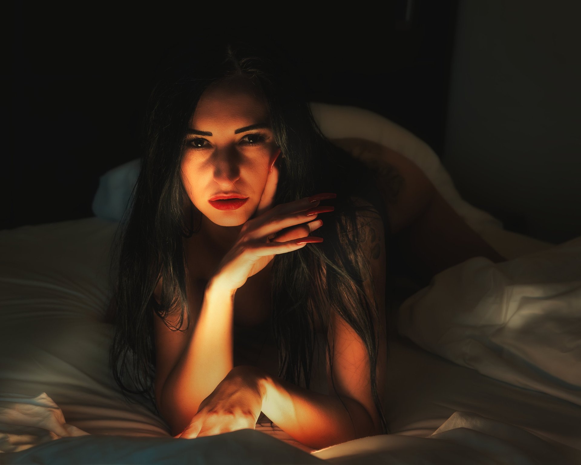 an abstract photo of a curved building with a blue sky in the background
