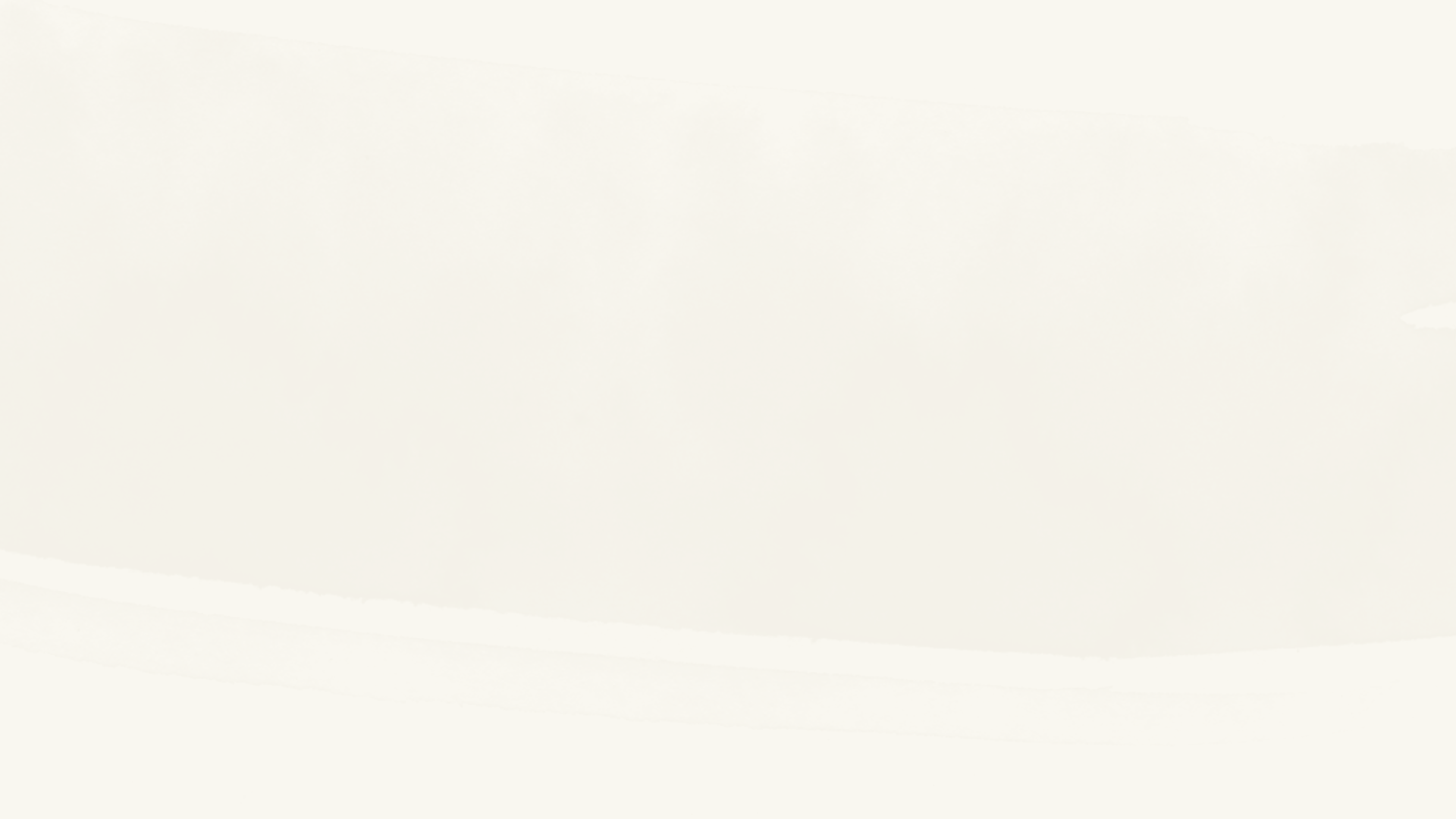 person hiking above mountain overlooking river