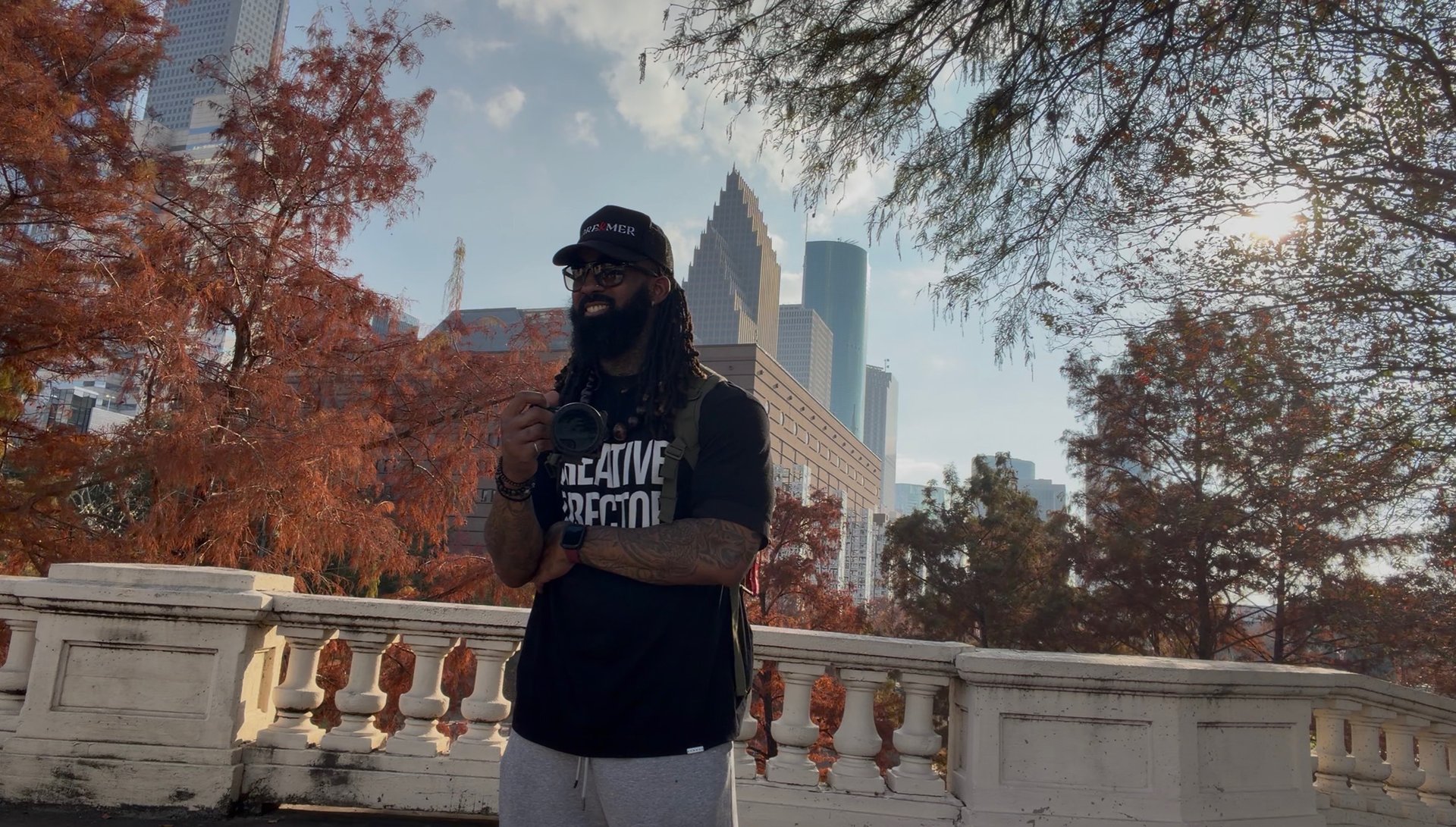 woman wearing yellow long-sleeved dress under white clouds and blue sky during daytime