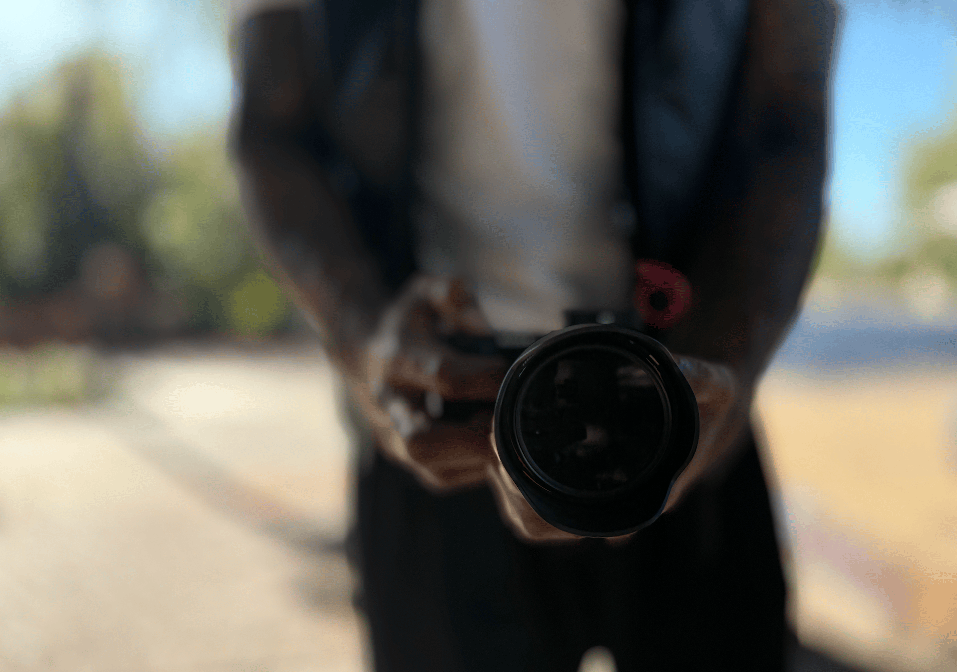 woman wearing yellow long-sleeved dress under white clouds and blue sky during daytime