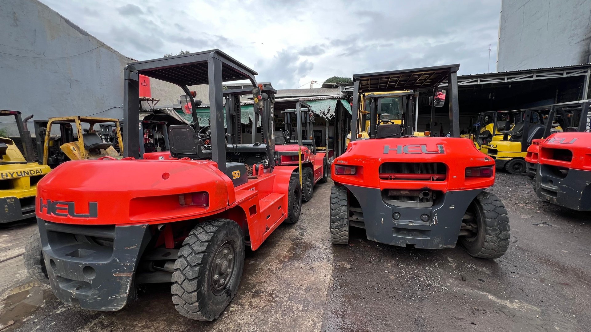 black and brown leather padded tub sofa