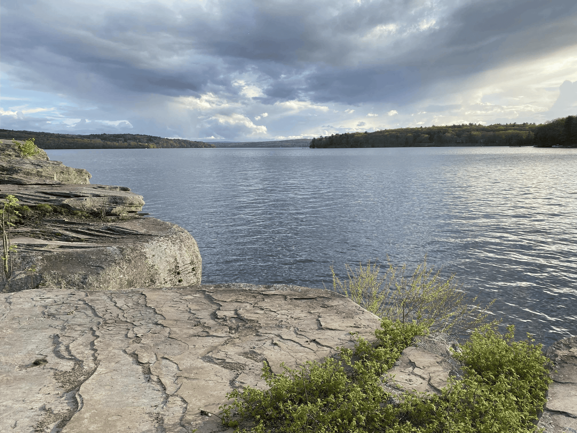 an abstract photo of a curved building with a blue sky in the background