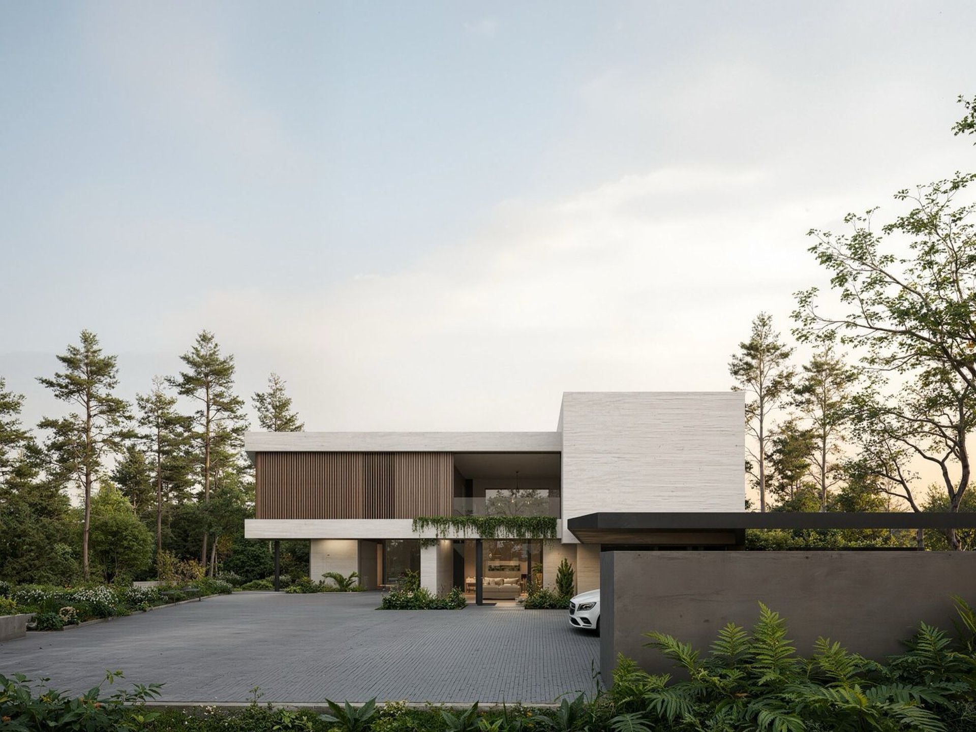 three people sitting in front of table laughing together