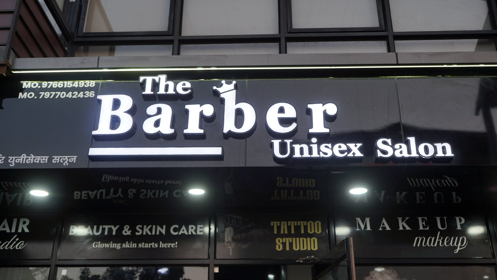 A woman getting her hair done by a hair stylist