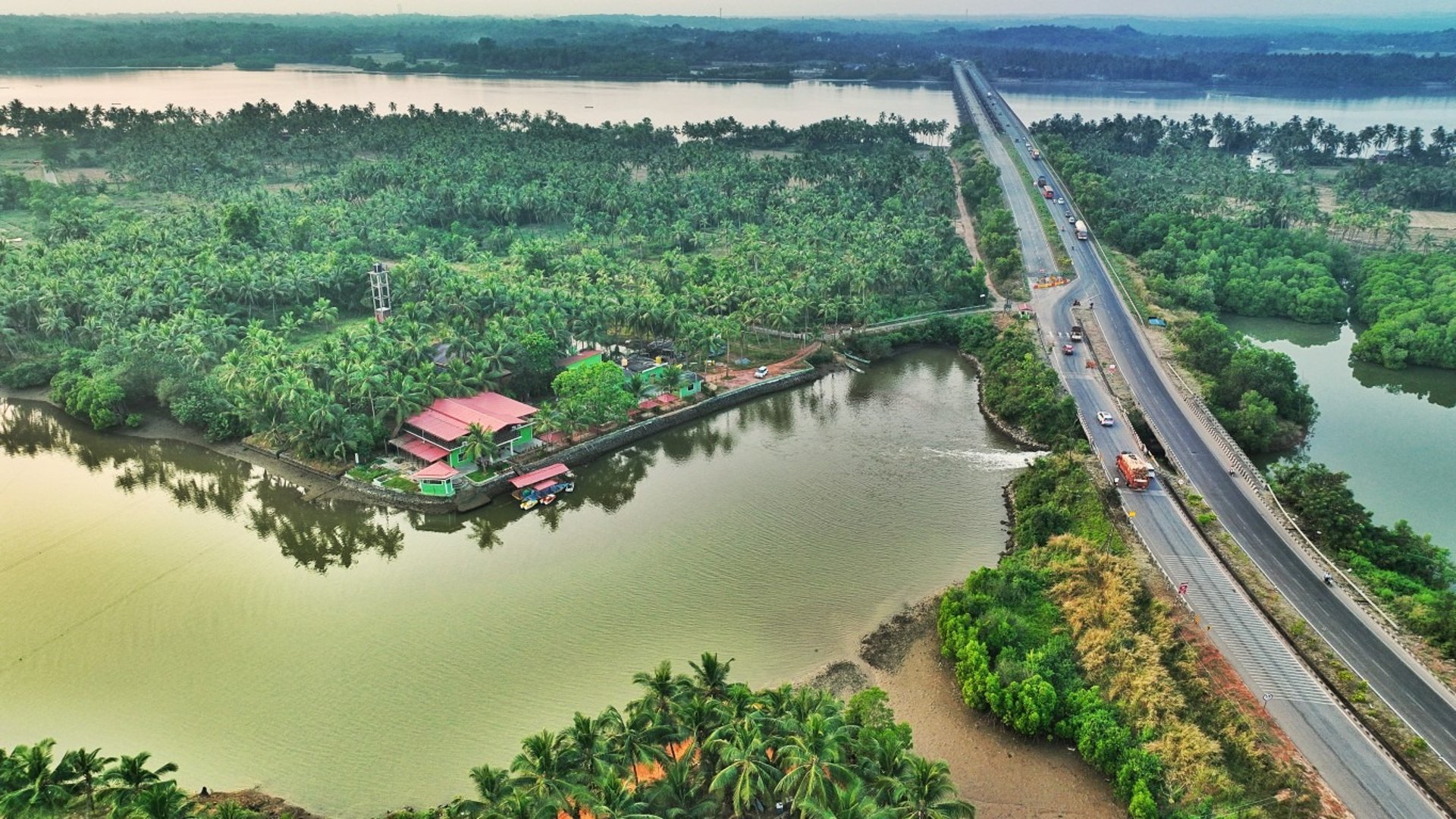 an abstract photo of a curved building with a blue sky in the background