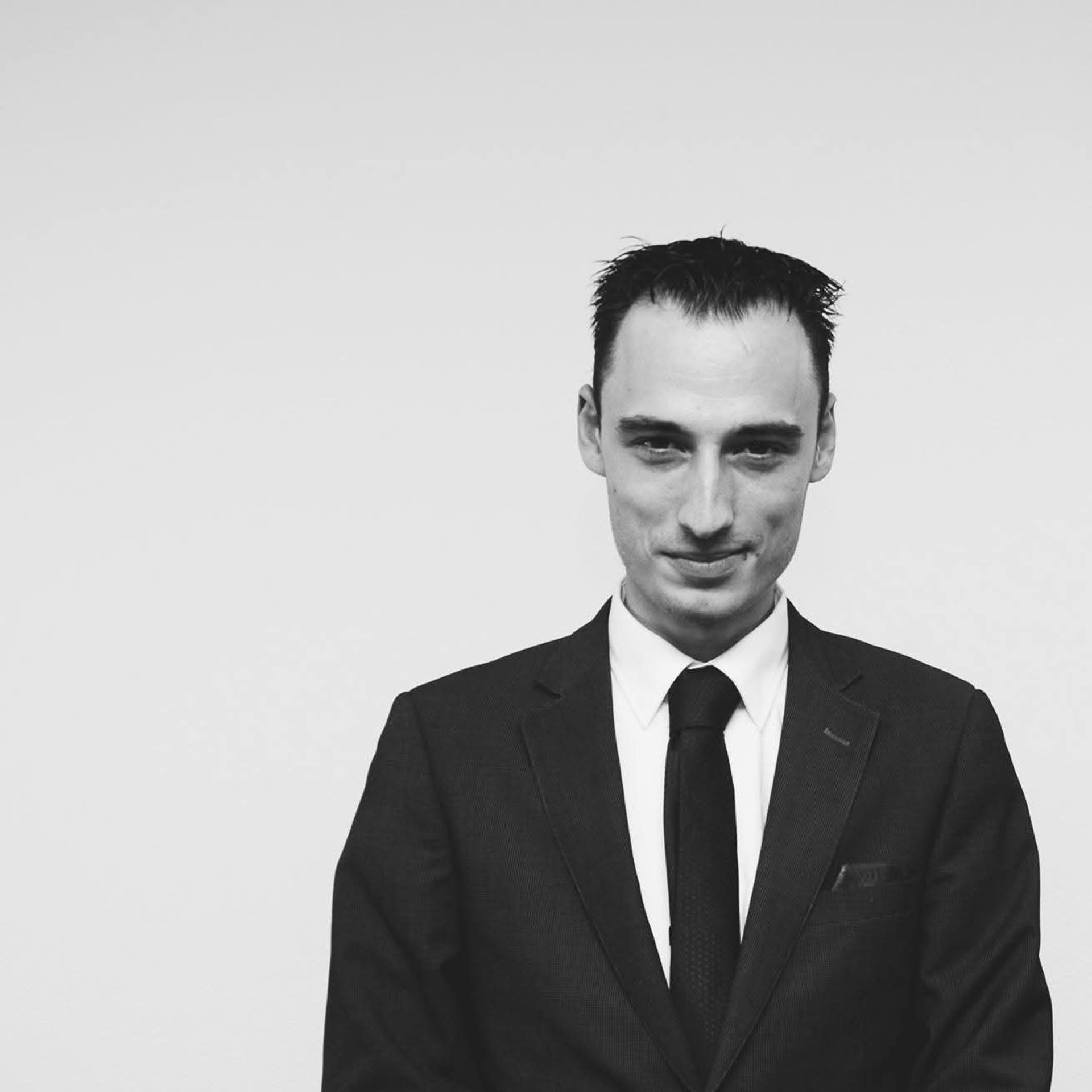 black and brown leather padded tub sofa