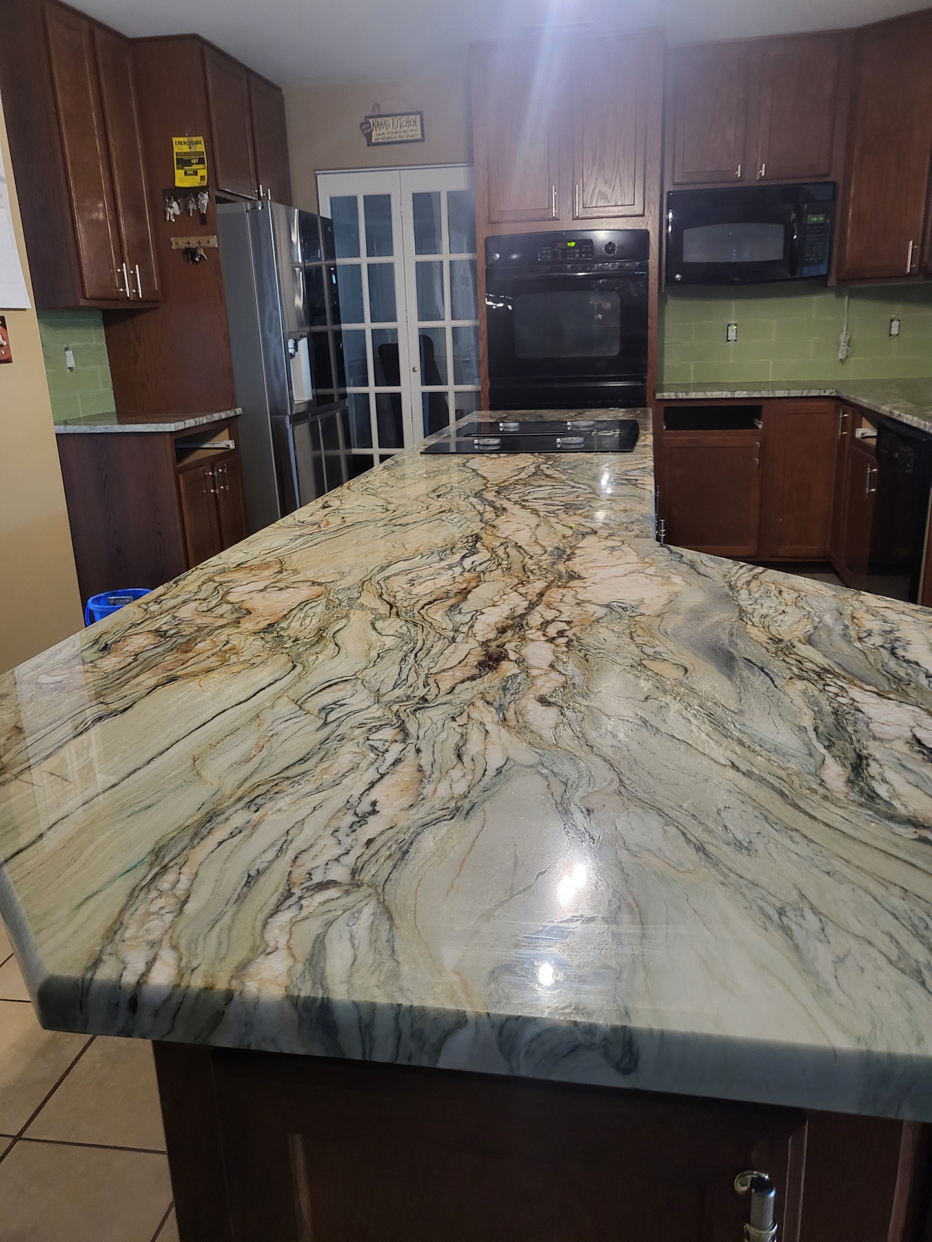 an abstract photo of a curved building with a blue sky in the background