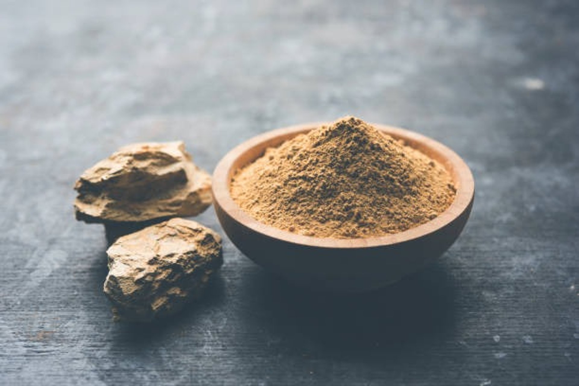 grayscale photography of woman wearing long-sleeved shirt