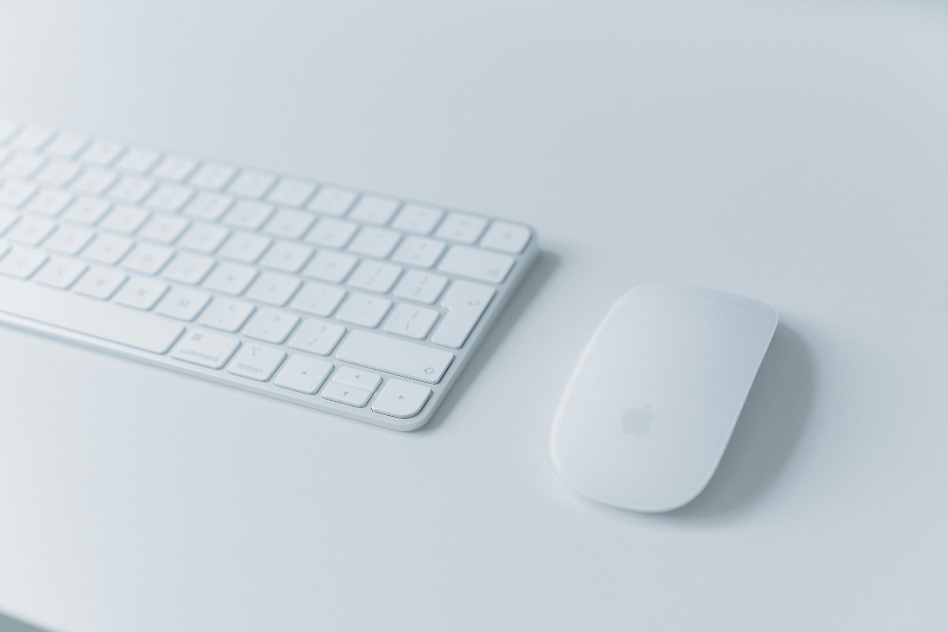 black iphone 5 on white surface