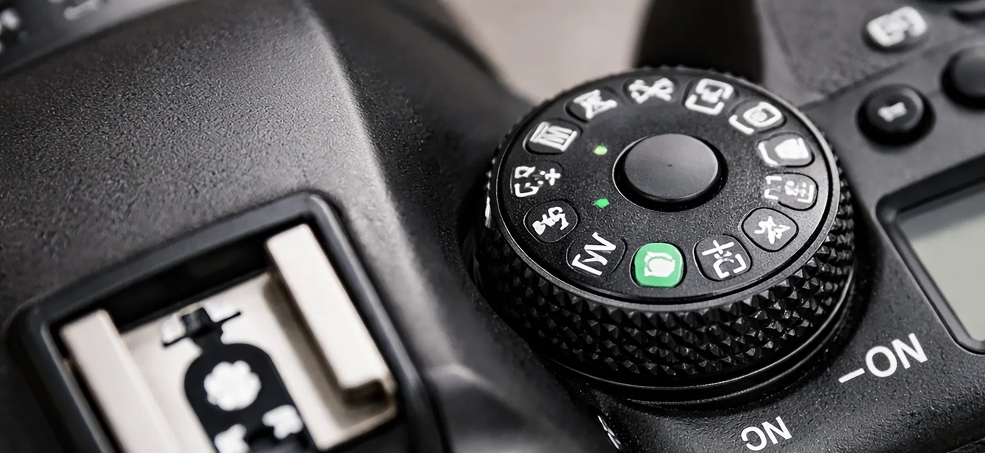 an abstract photo of a curved building with a blue sky in the background