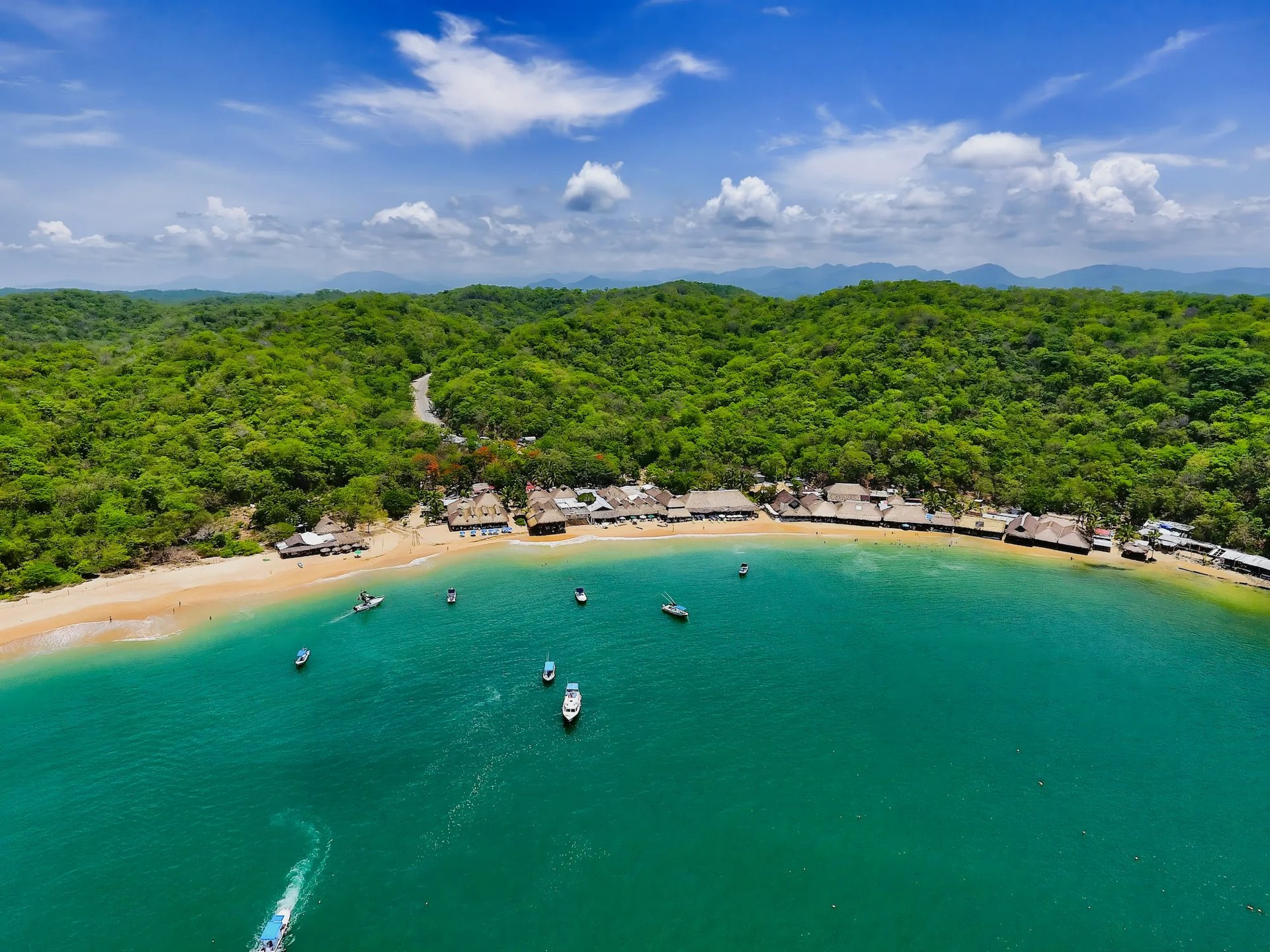 an abstract photo of a curved building with a blue sky in the background