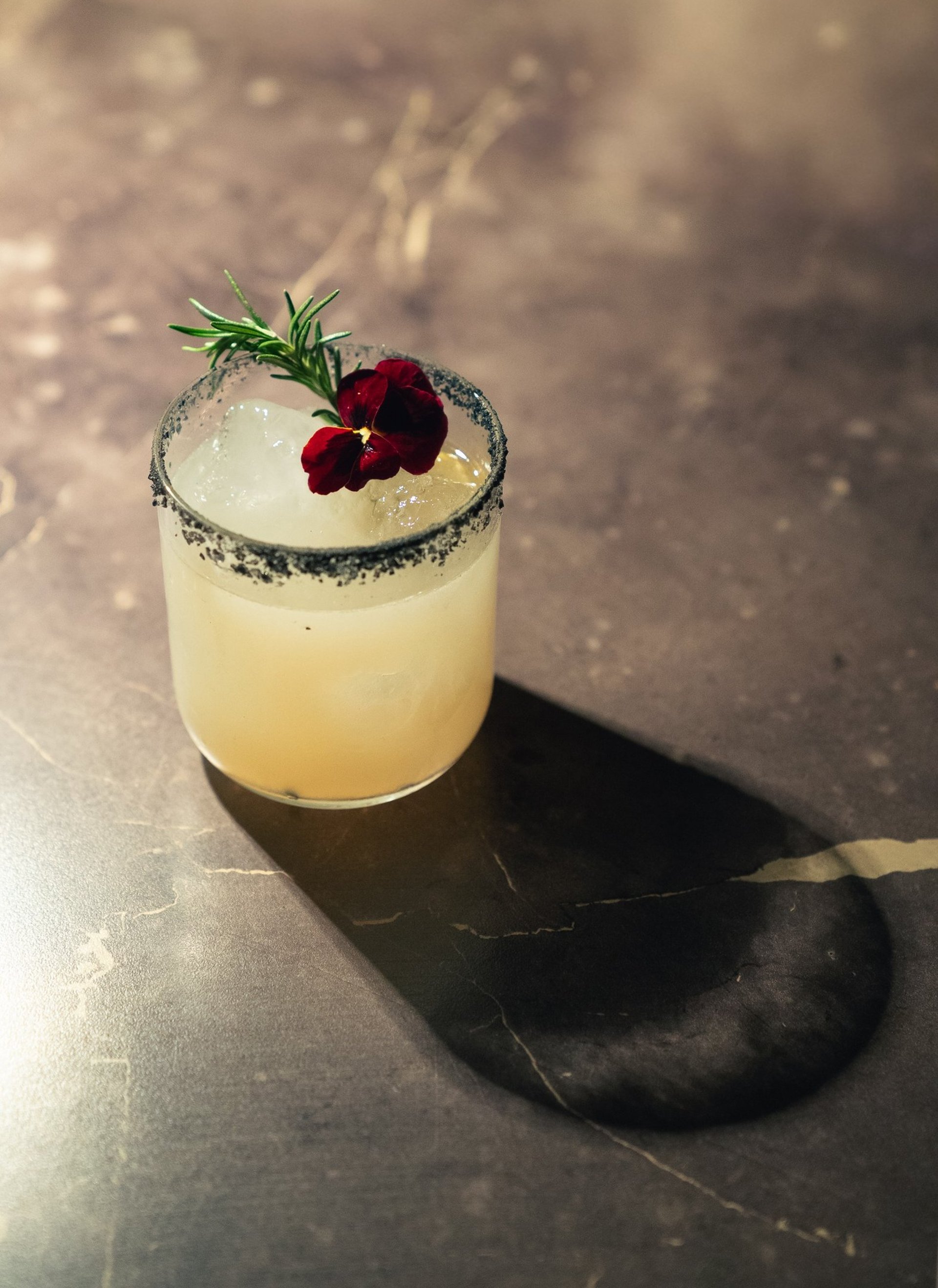 woman wearing yellow long-sleeved dress under white clouds and blue sky during daytime