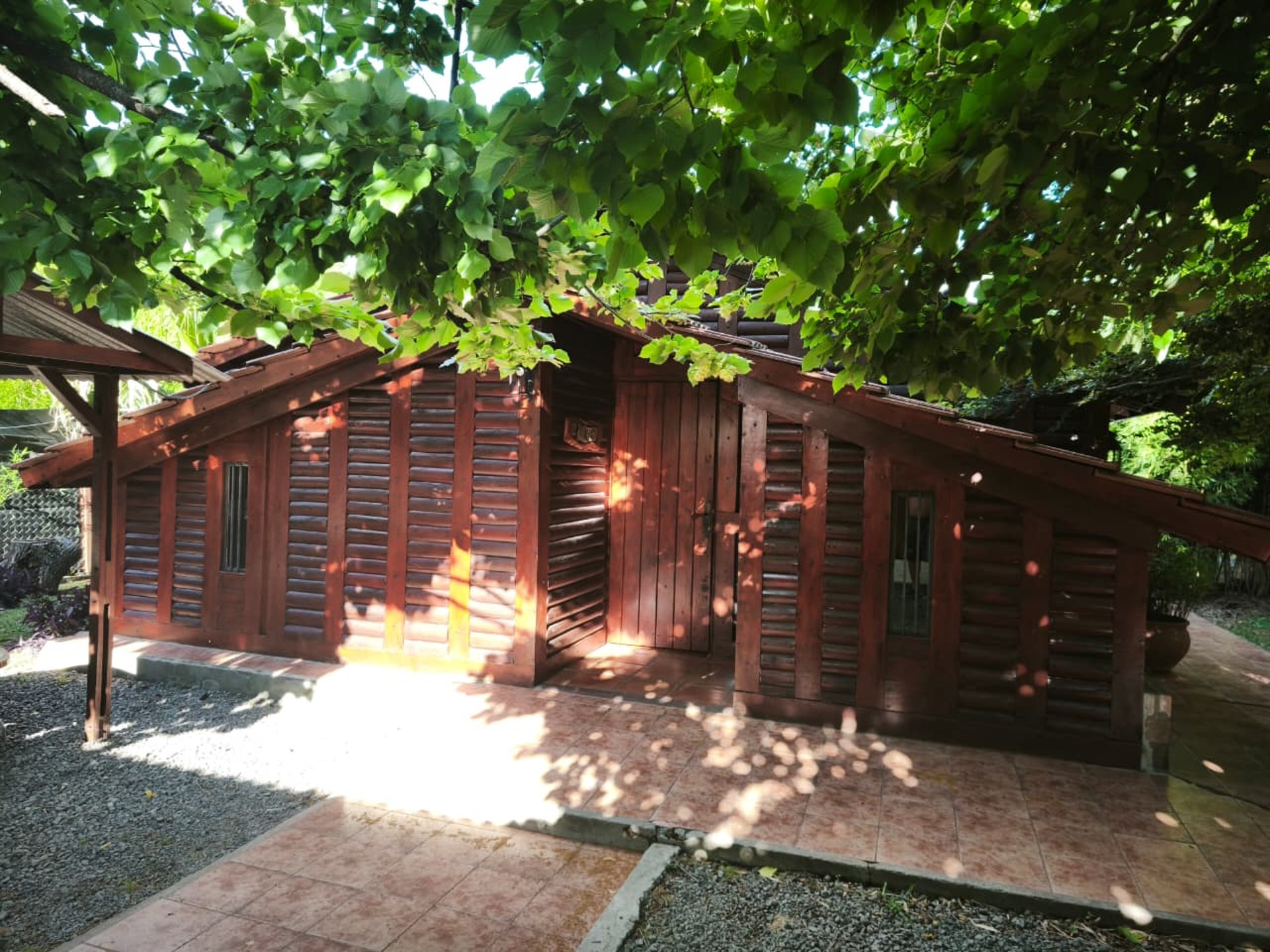 black and brown leather padded tub sofa