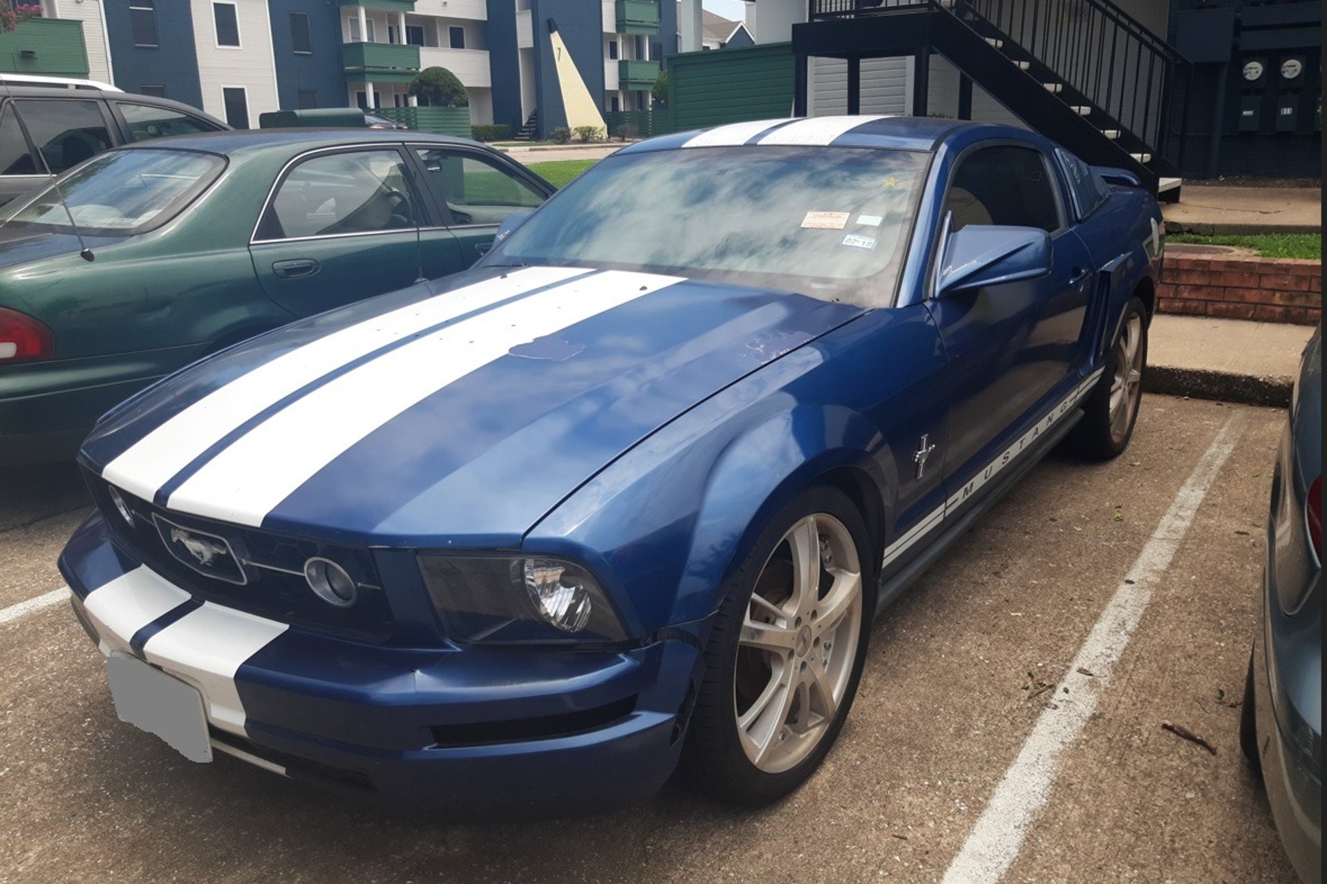 Junk car mustang with stripes