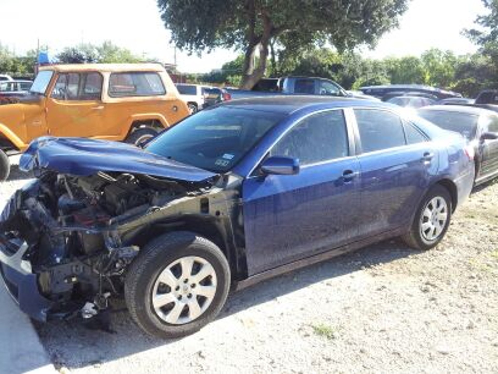 Junk car blue wrecked front end