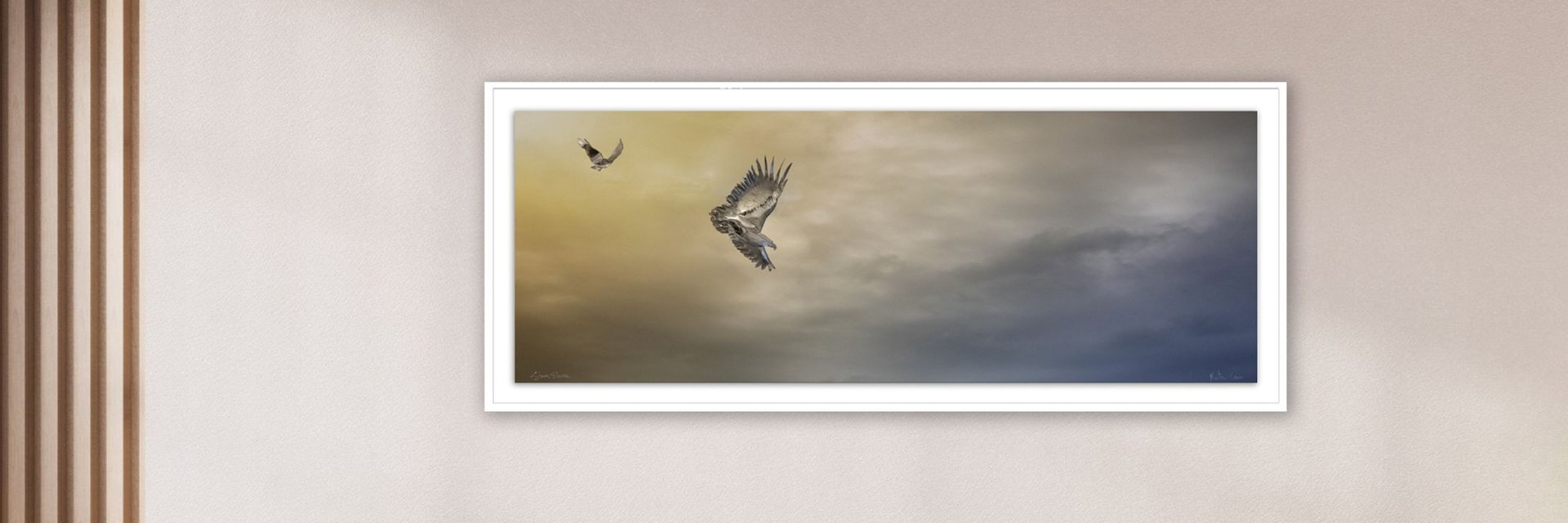 Framed artwork of two birds soaring against a golden and blue sky – African Art Fusion piece by Martin Osner and Simon Shone