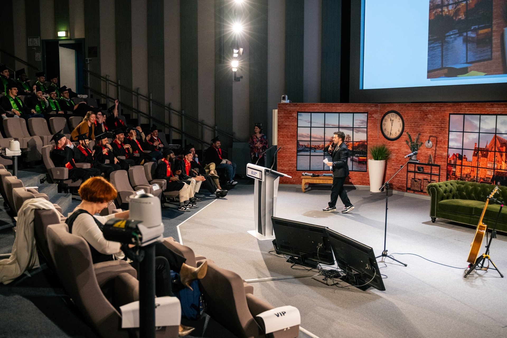 an abstract photo of a curved building with a blue sky in the background