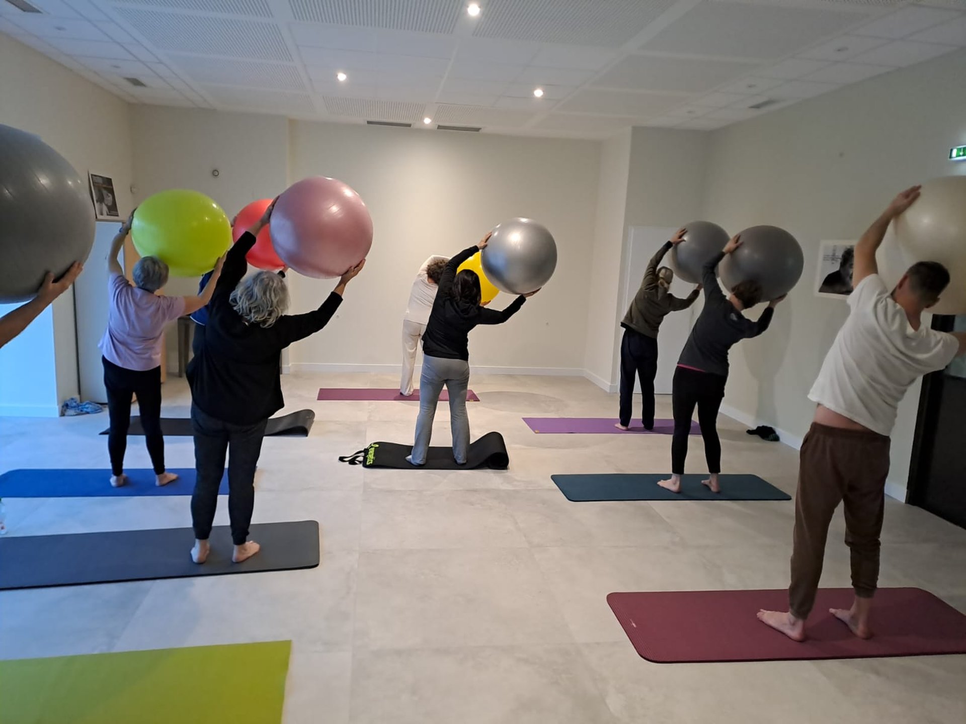 an abstract photo of a curved building with a blue sky in the background