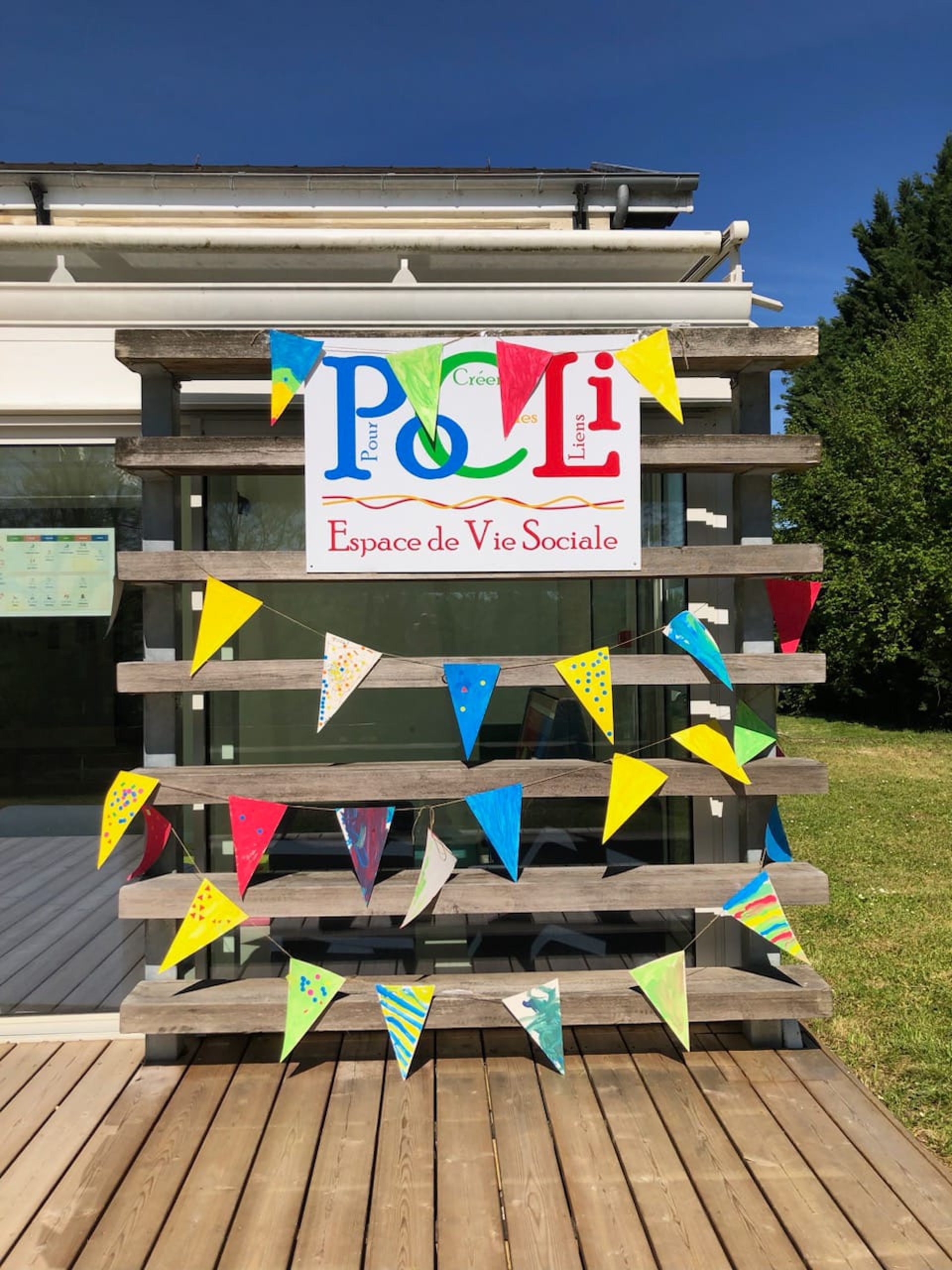 an abstract photo of a curved building with a blue sky in the background