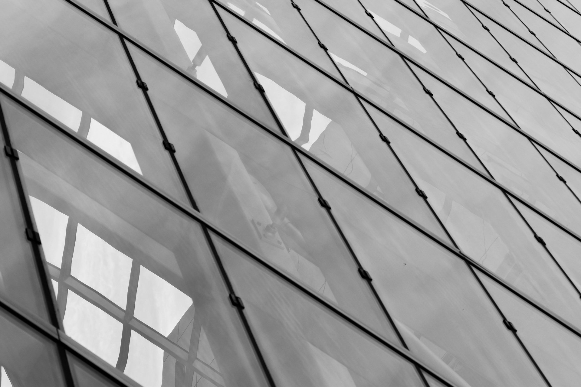 low angle photography of building under blue sky