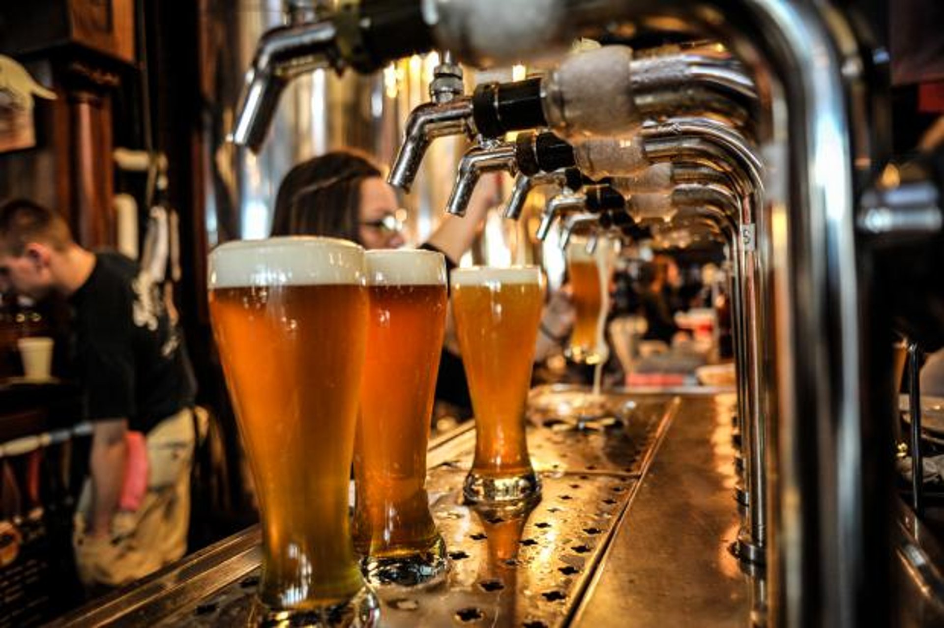 two mugs of brown liquids