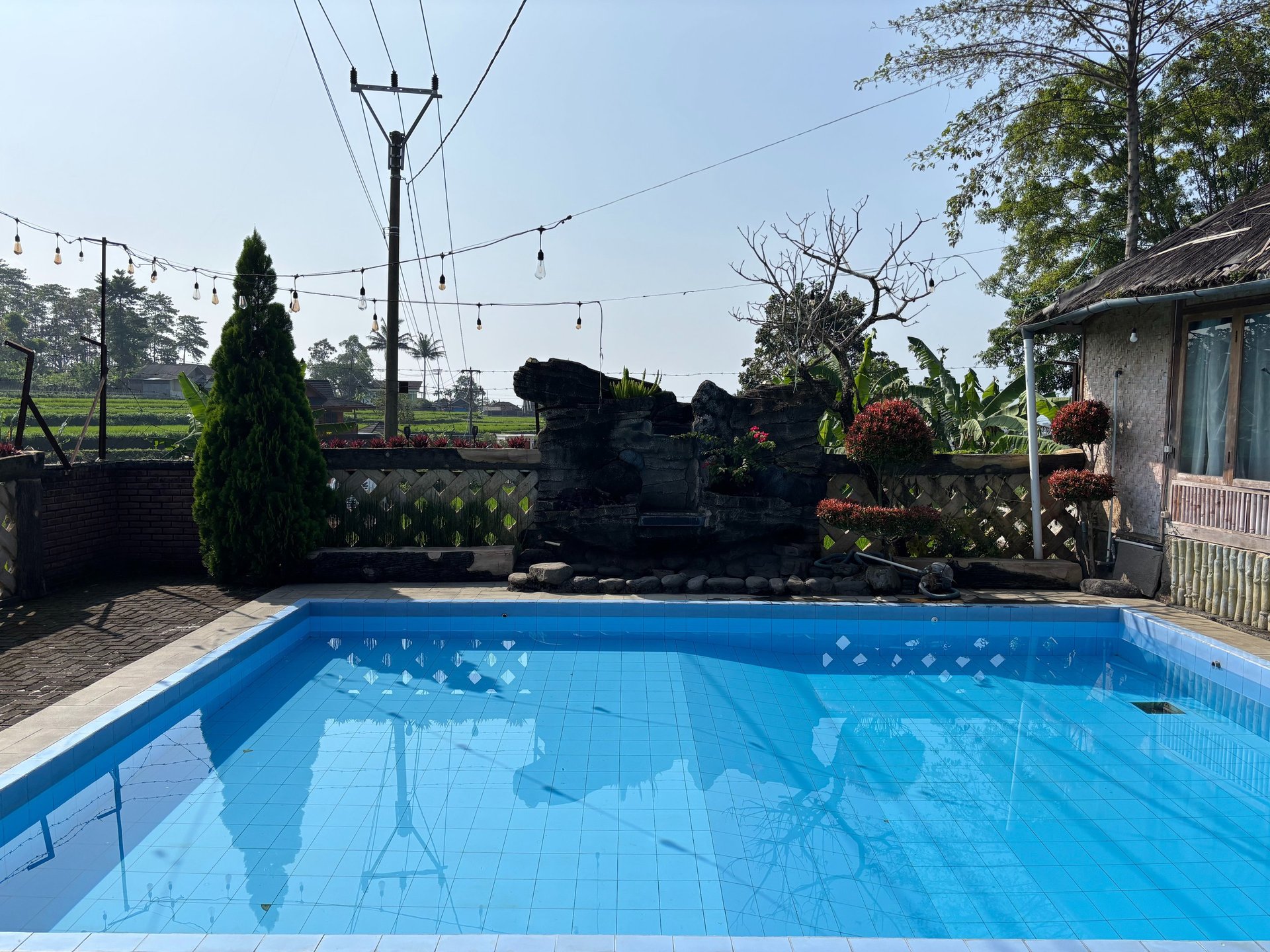 a person is floating in a pool with an inflatable raft