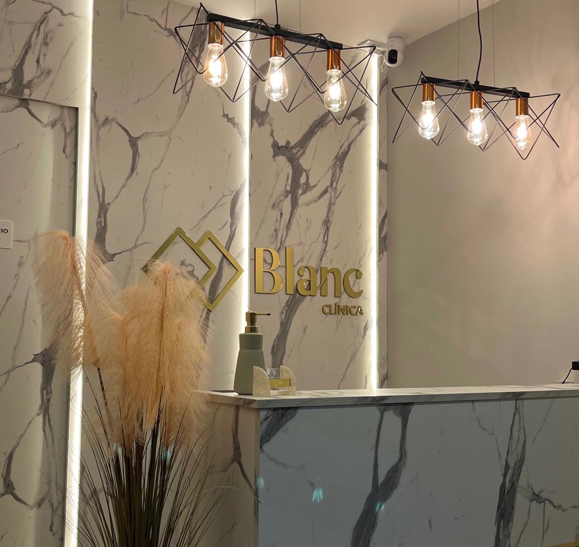 an abstract photo of a curved building with a blue sky in the background