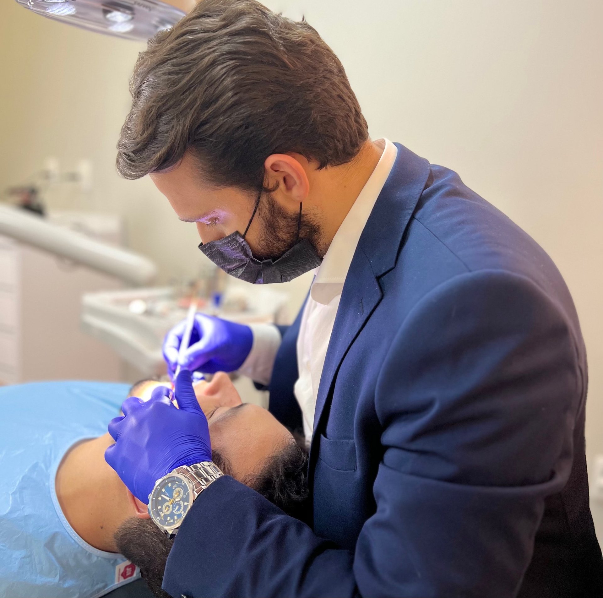 an abstract photo of a curved building with a blue sky in the background