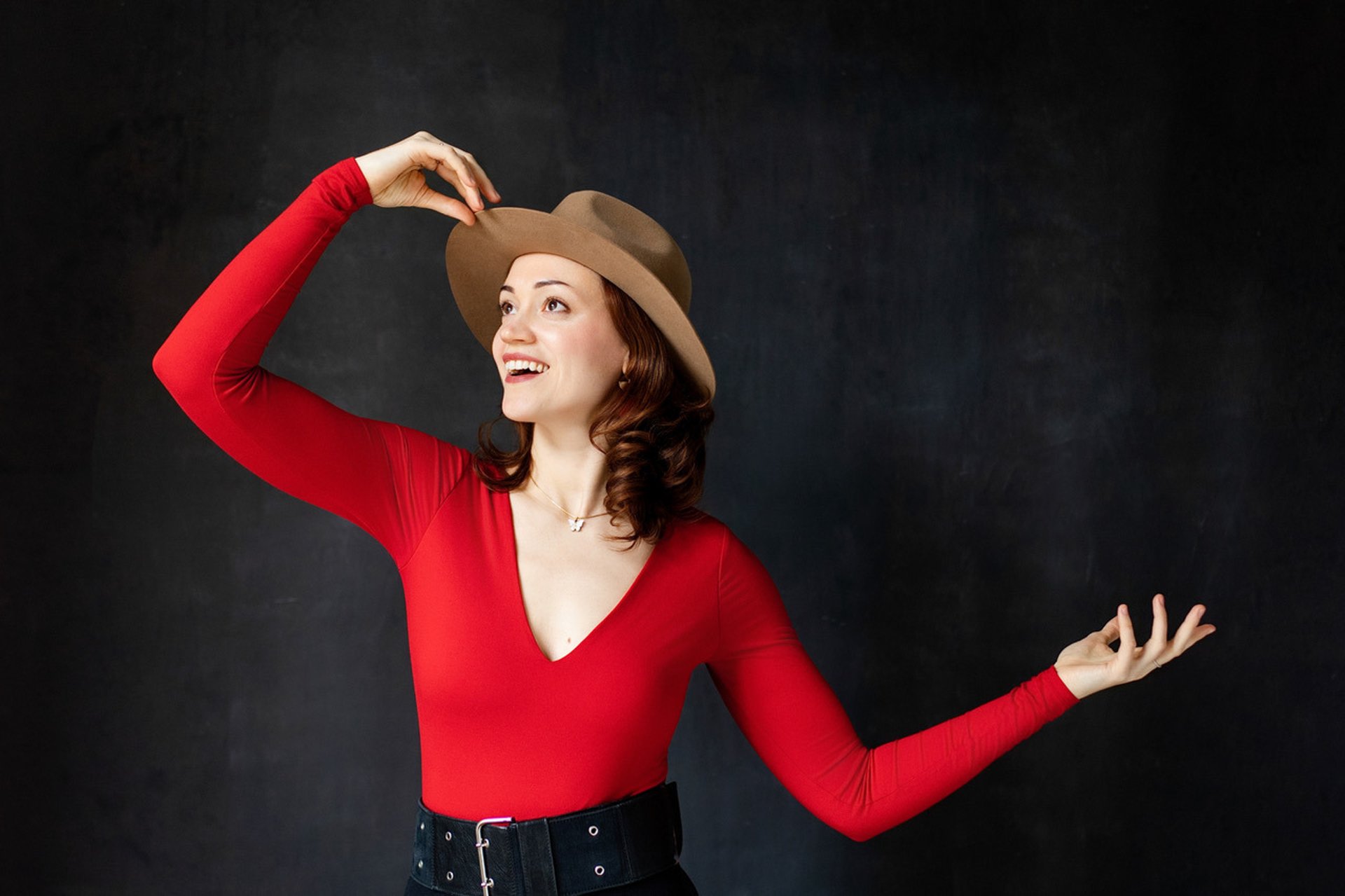 black and brown leather padded tub sofa