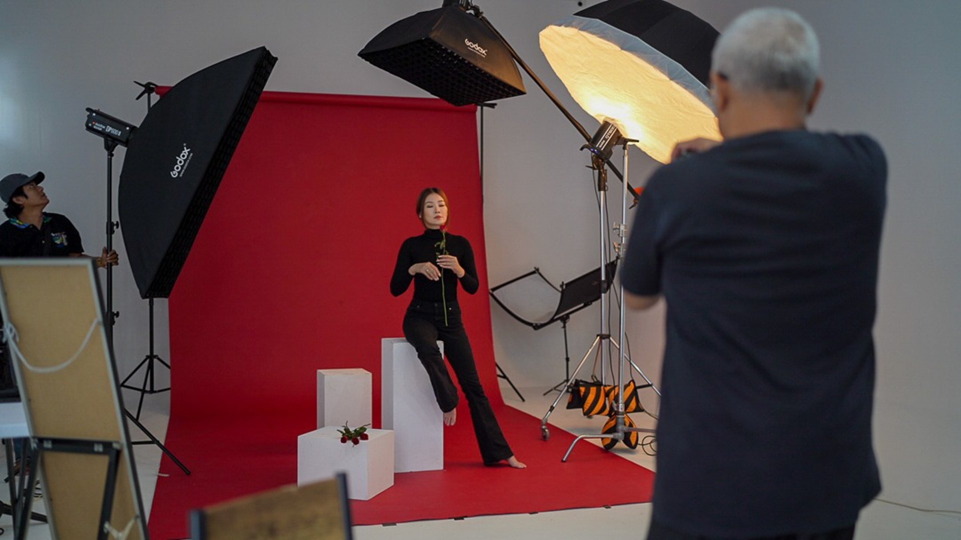 woman wearing yellow long-sleeved dress under white clouds and blue sky during daytime