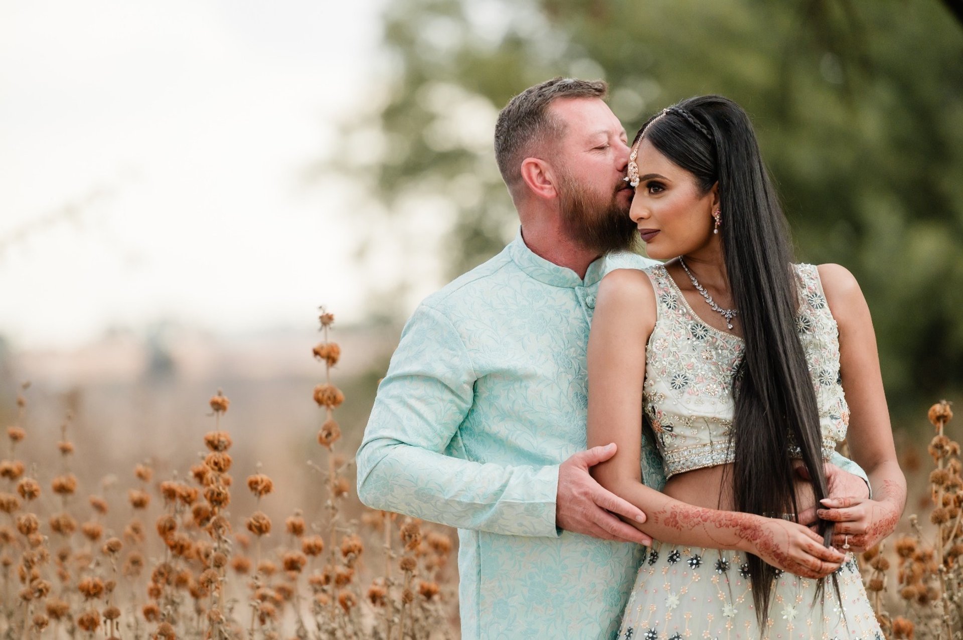 couple wearing silver-colored rings