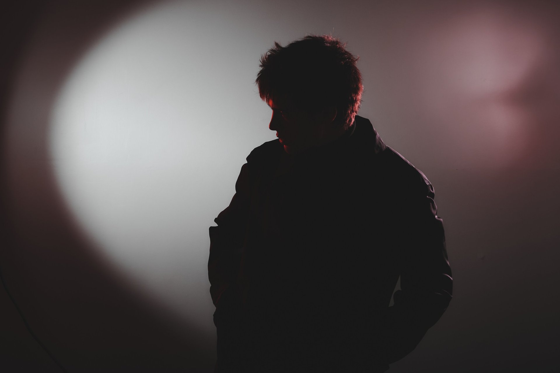 an abstract photo of a curved building with a blue sky in the background