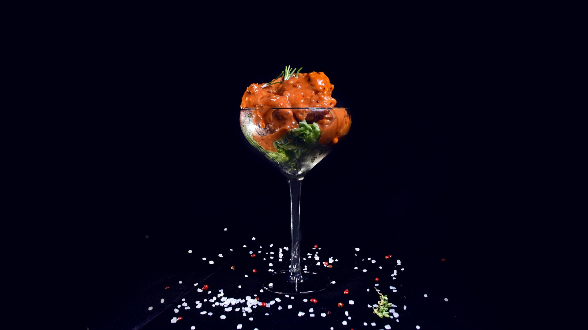 an abstract photo of a curved building with a blue sky in the background