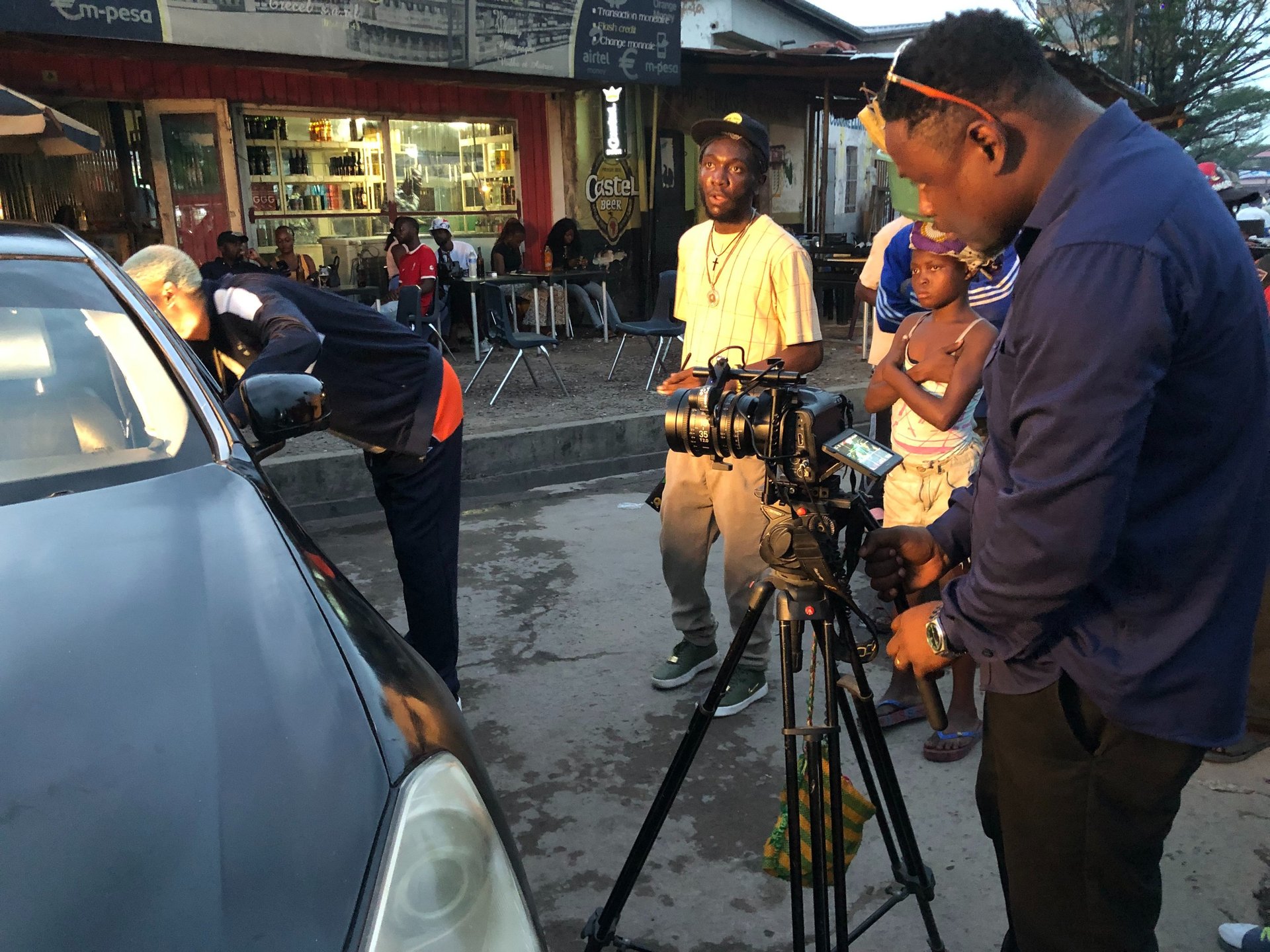 an abstract photo of a curved building with a blue sky in the background