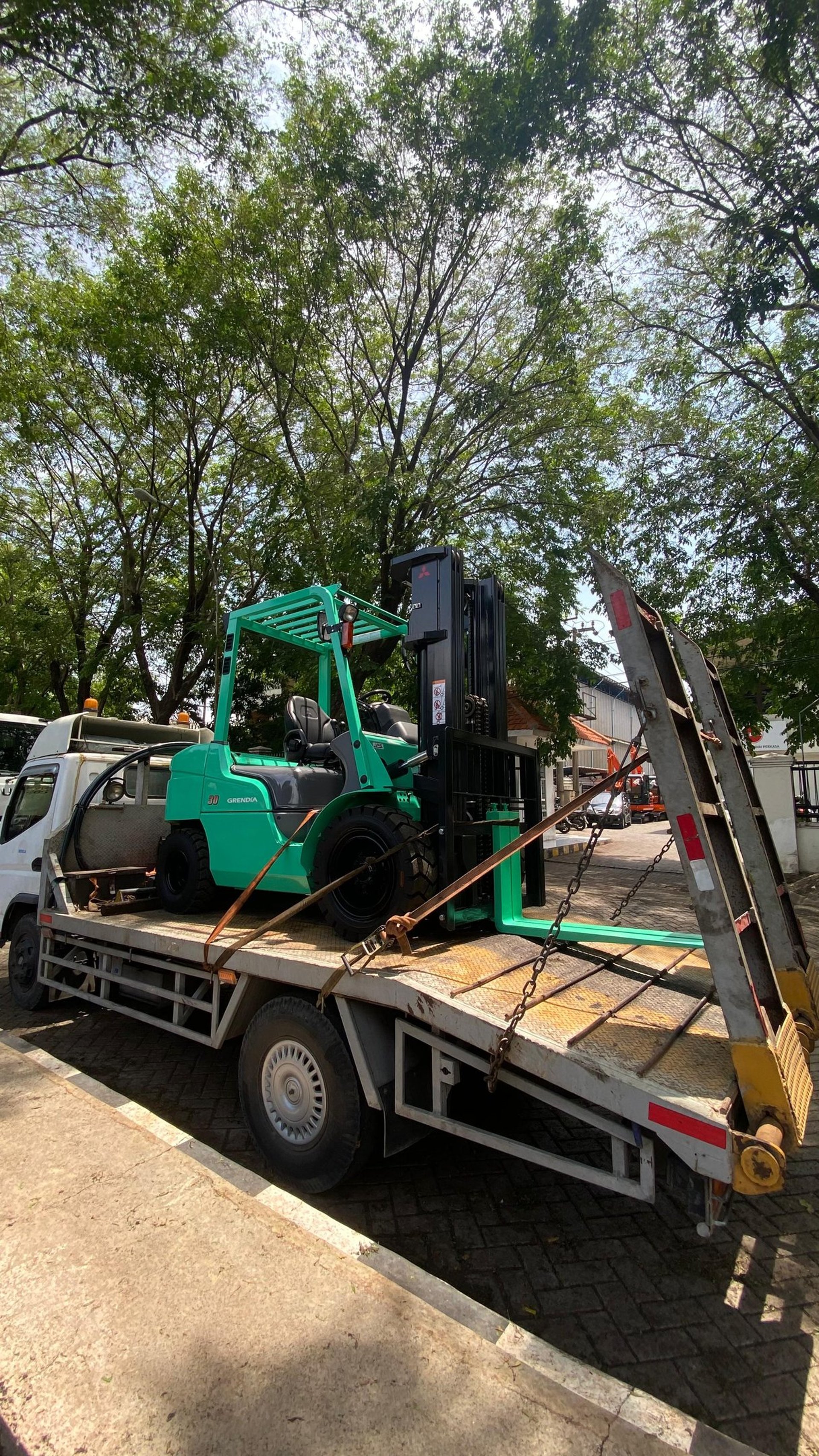 woman wearing yellow long-sleeved dress under white clouds and blue sky during daytime