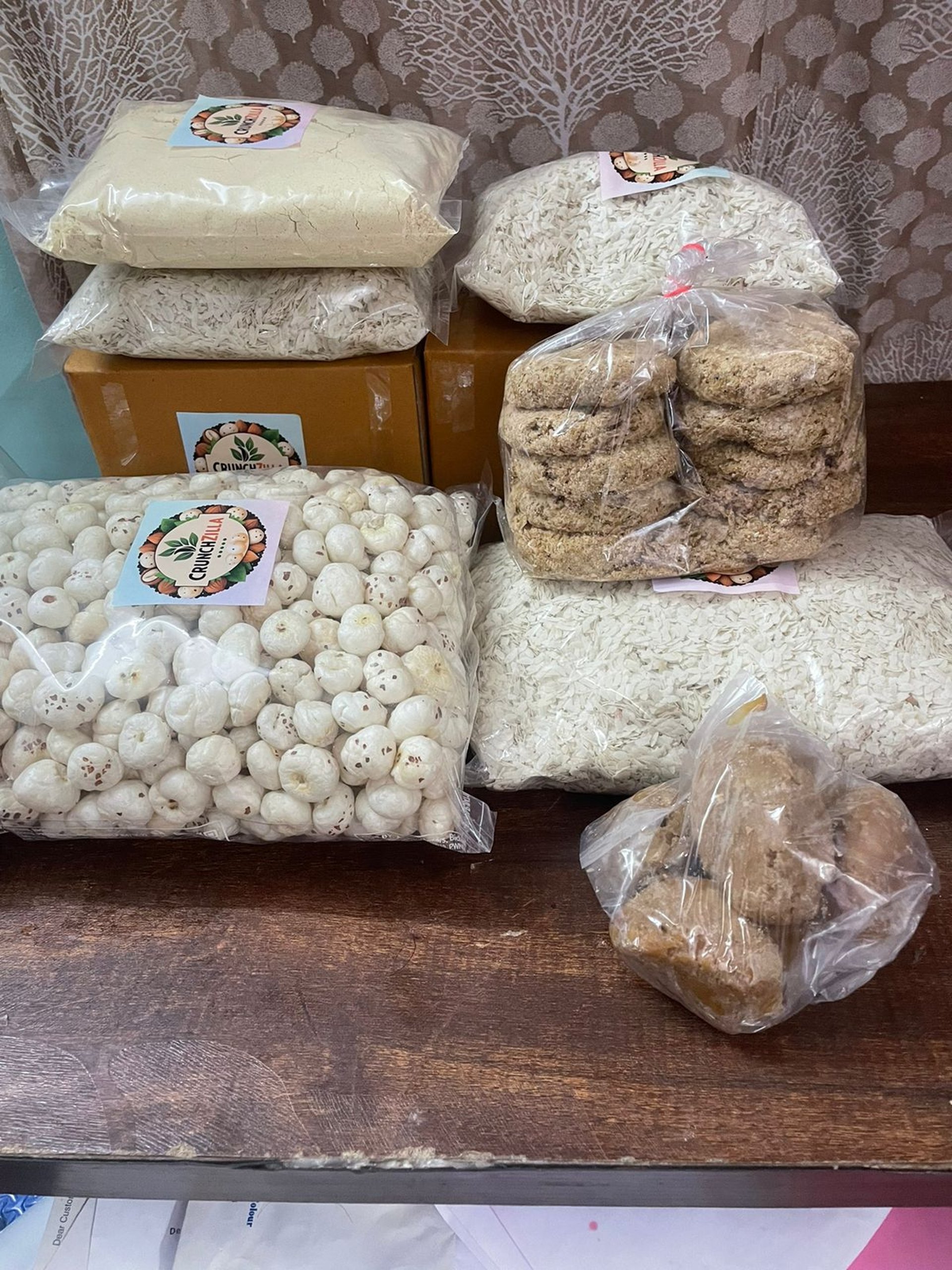 a scoop of powder and a scoop of powder on a white background