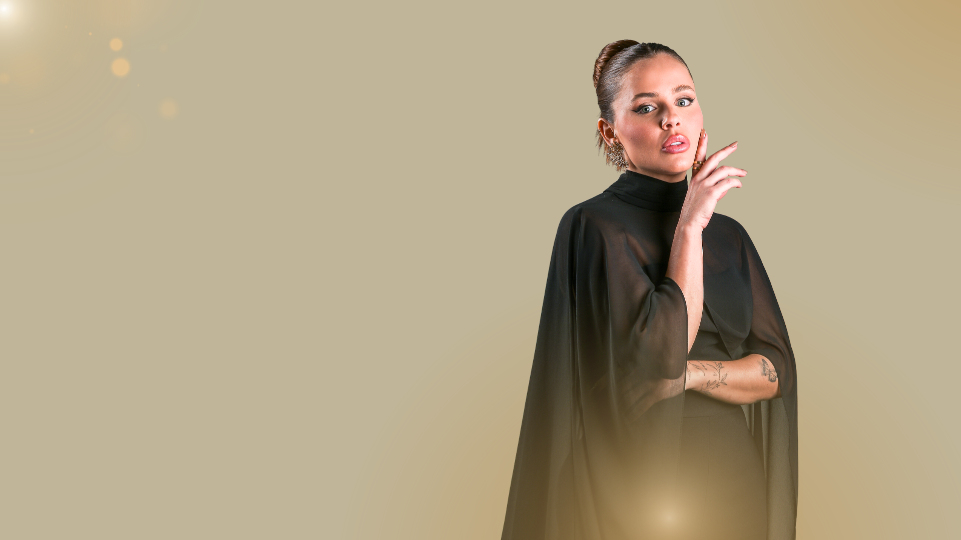 woman in white long-sleeved shirt standing in front of pink wall